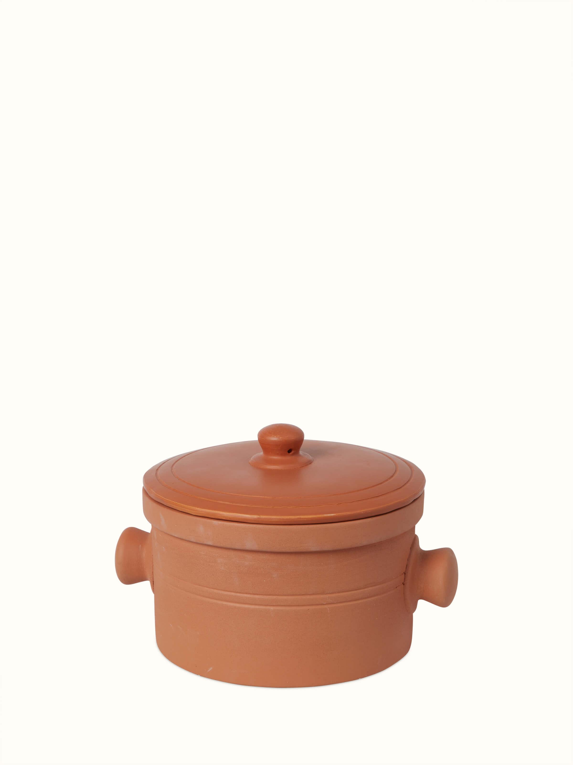 Front view of terracotta clay cooking pot, showcasing its traditional design