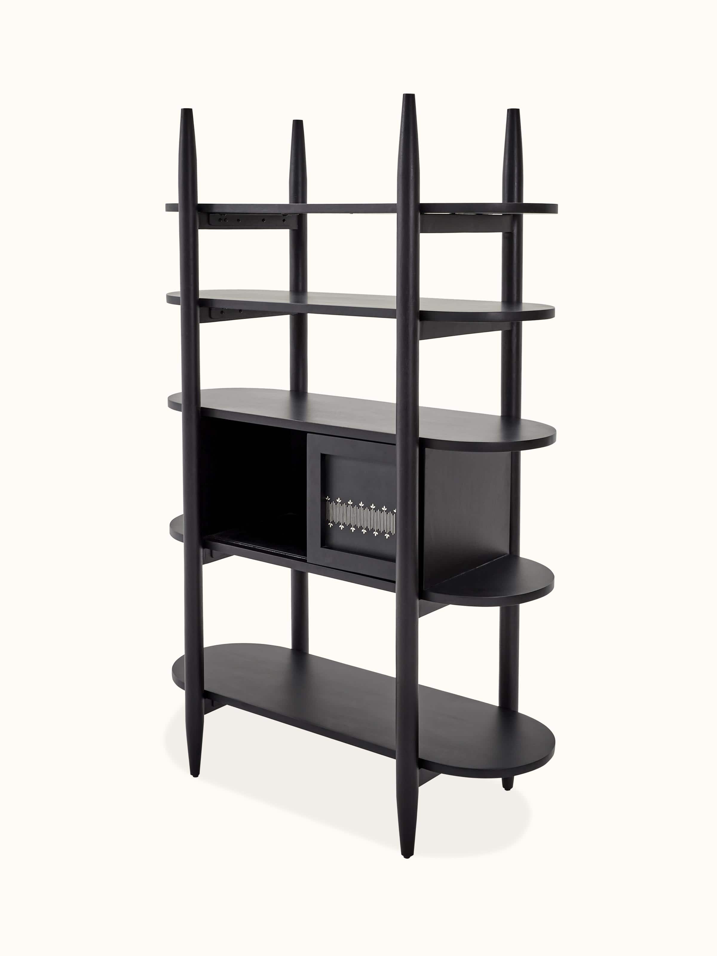 Close-up of the Bidriware inlay on the mango wood and metal bookshelf