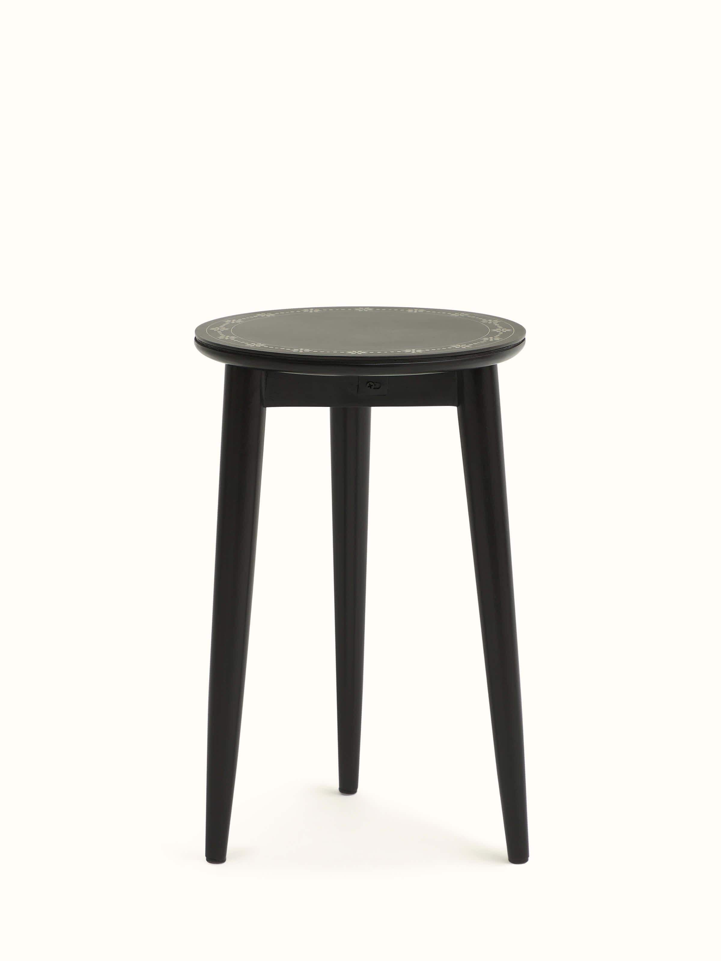 Angled view of Swadesh Mango Wood Bidri Side Table showcasing its elegant design and intricate Bidri inlays