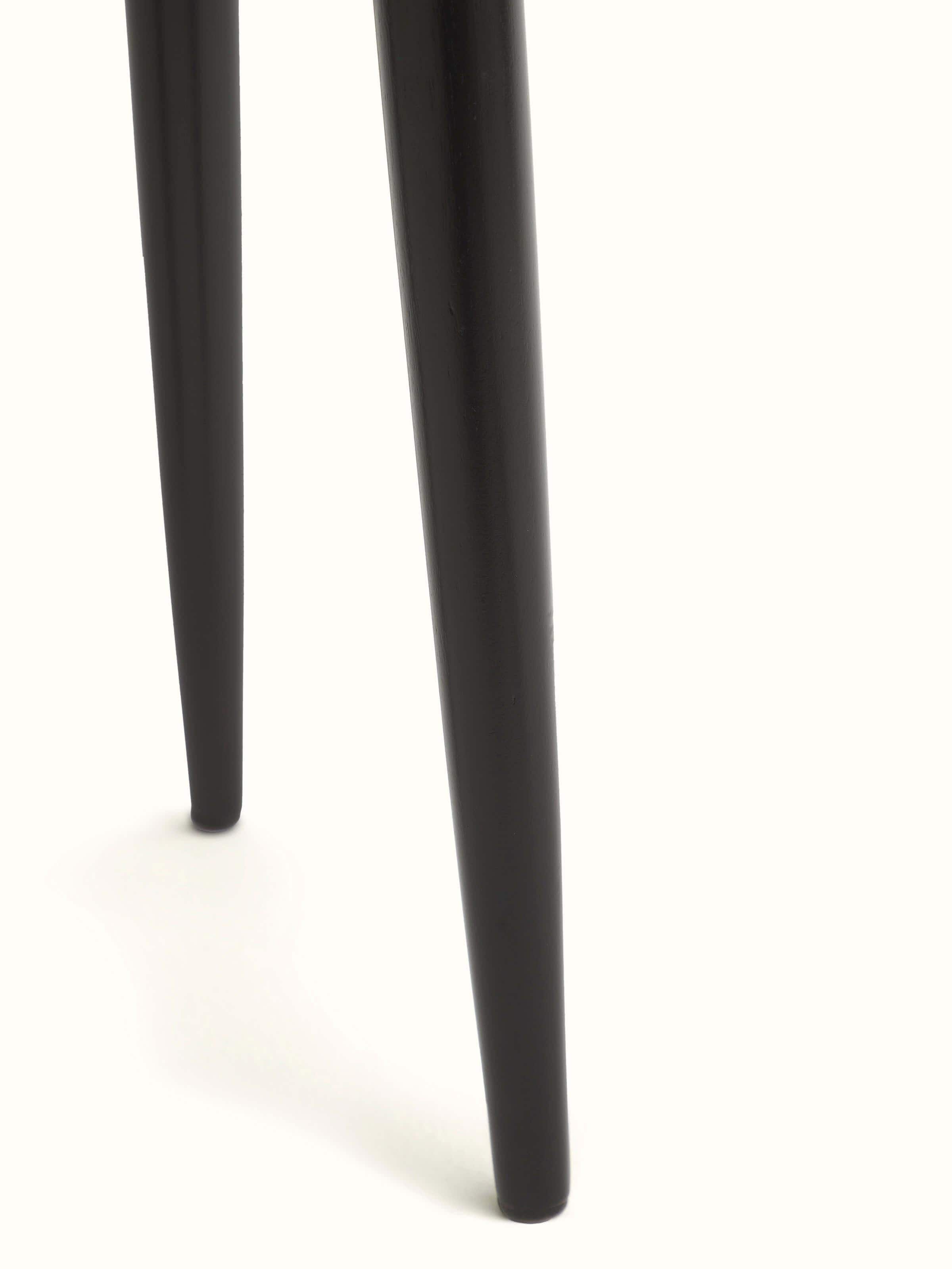 Back view of Swadesh Mango Wood Bidri Side Table highlighting its sturdy mango wood frame and unique decorative inlays