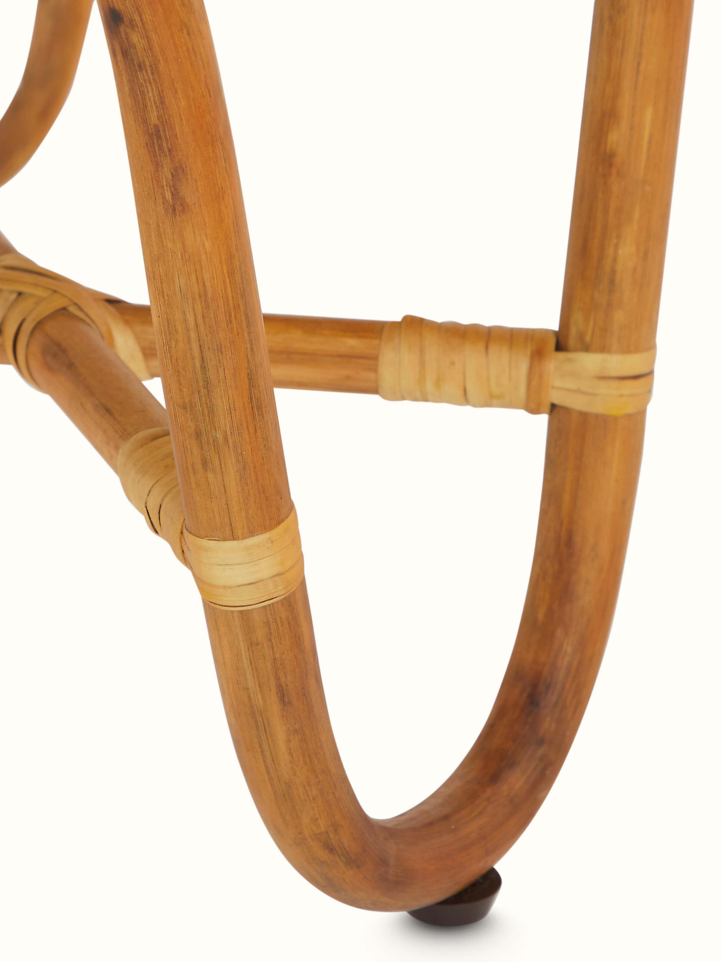 Close-up view of Cane Patio Table focusing on the fine cane details and finish