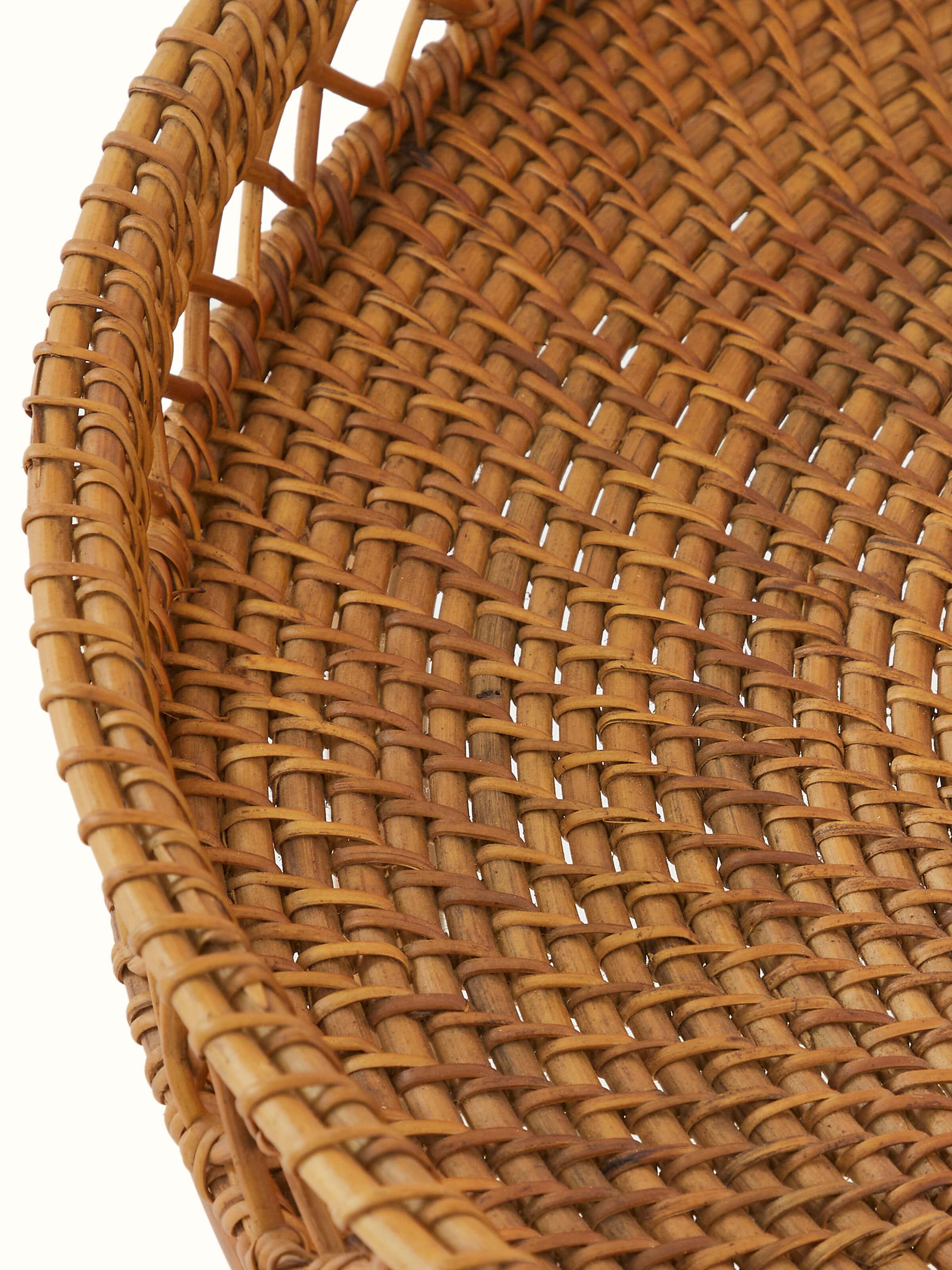 Detailed view of Cane Patio Table surface showcasing the weave and craftsmanship