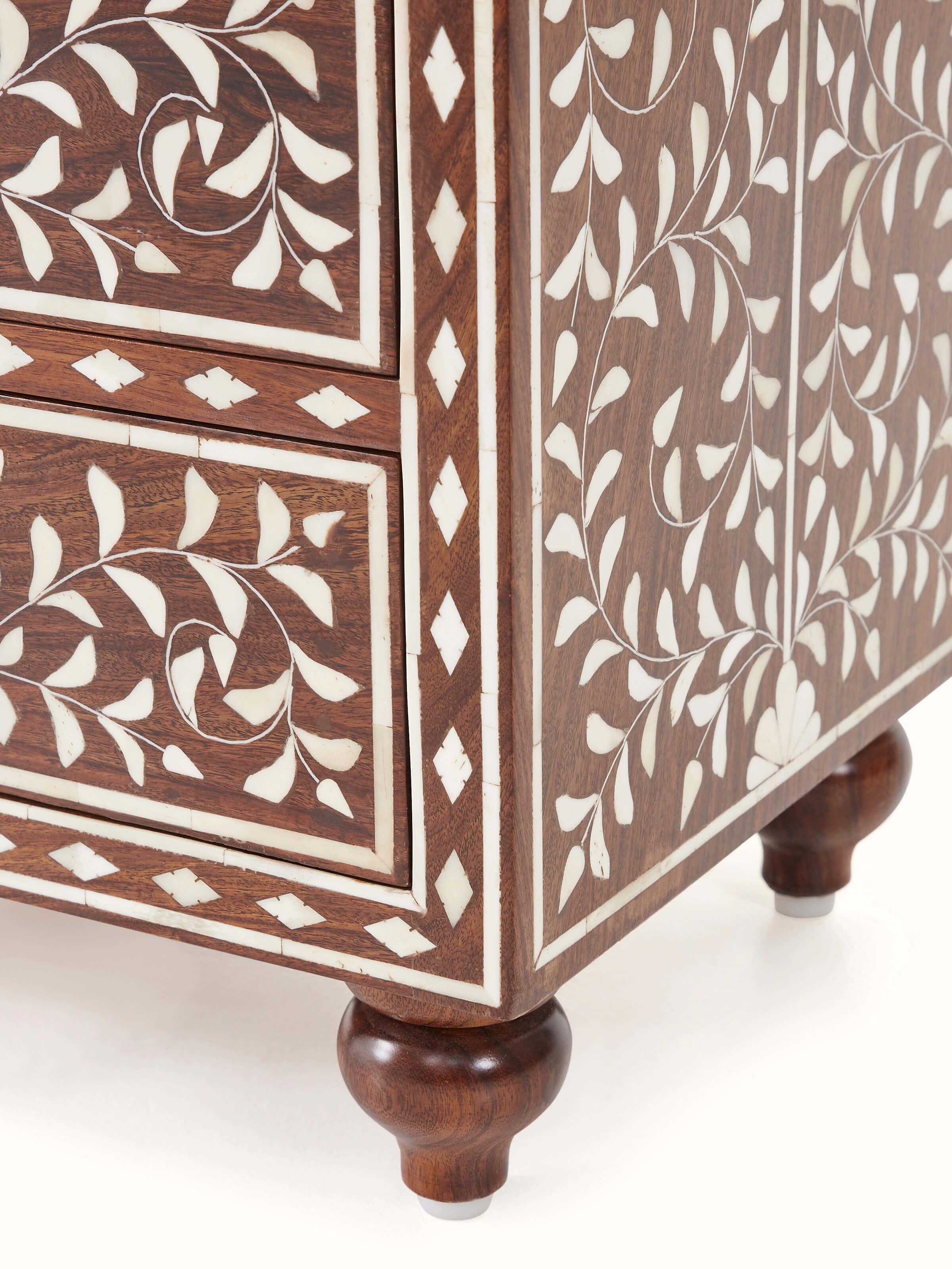 Drawer open view of Sheesham wood bone inlay bedside table, displaying functional storage space