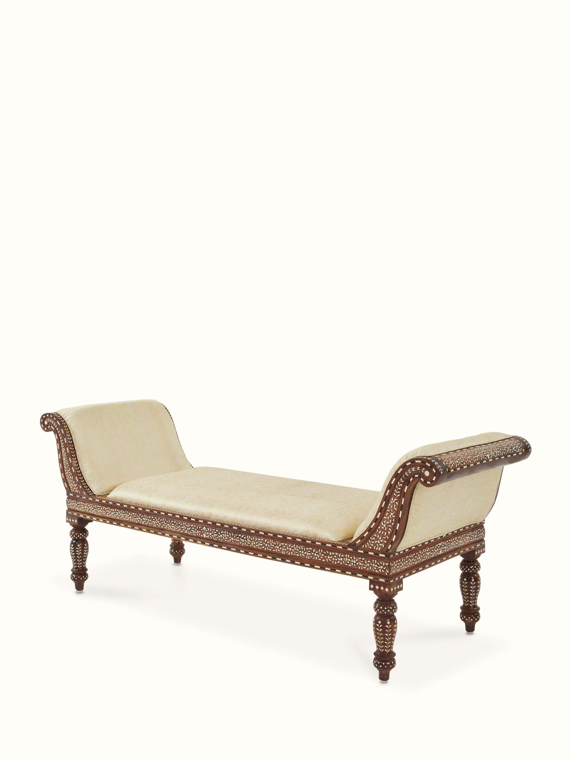 Close-up of the upholstered Sheesham wood bench showing detailed bone inlay and fabric upholstery