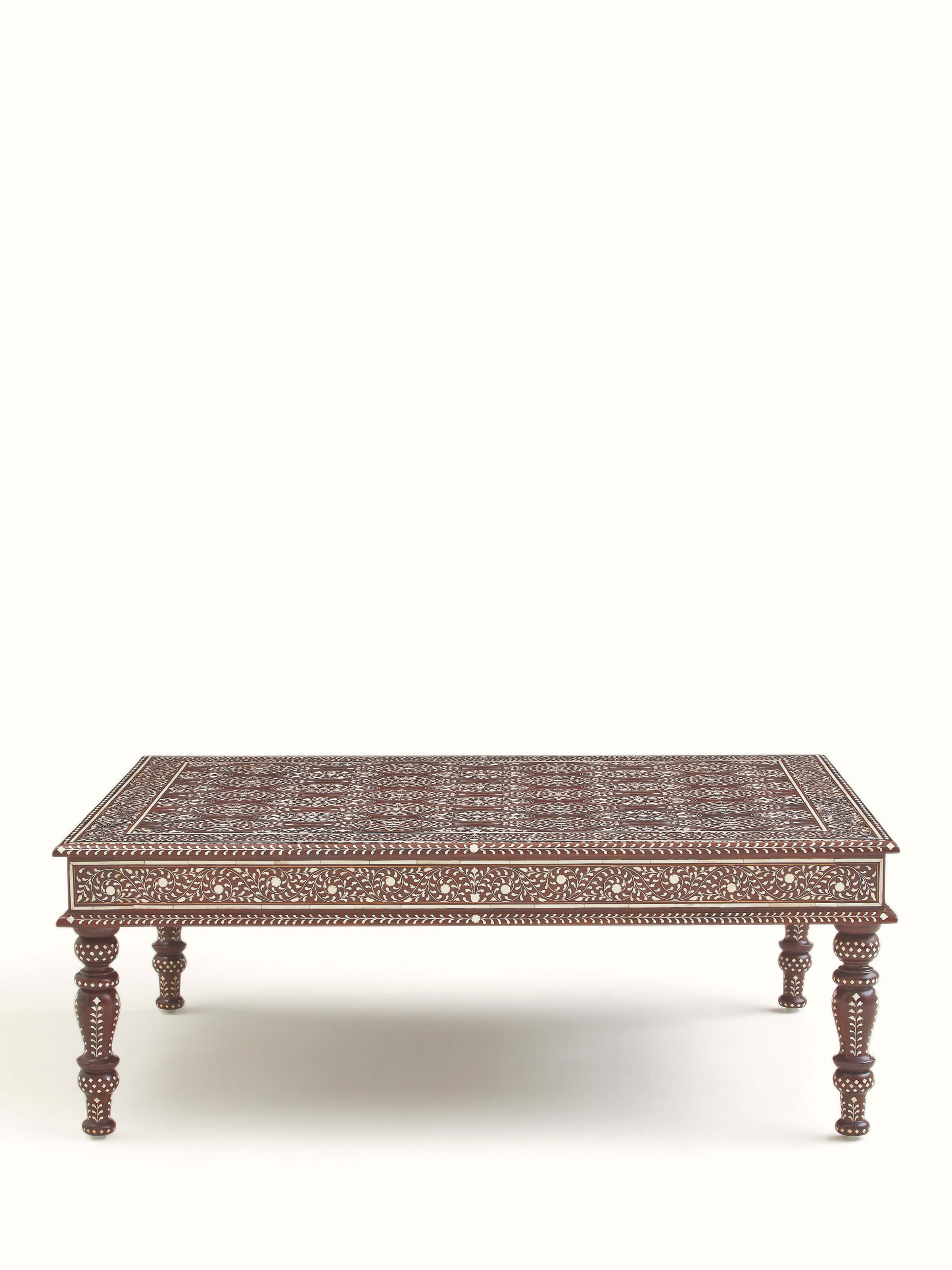 Front view of Bone Inlay Sheesham Wood Coffee Table showcasing intricate bone inlay work and rich sheesham wood finish.