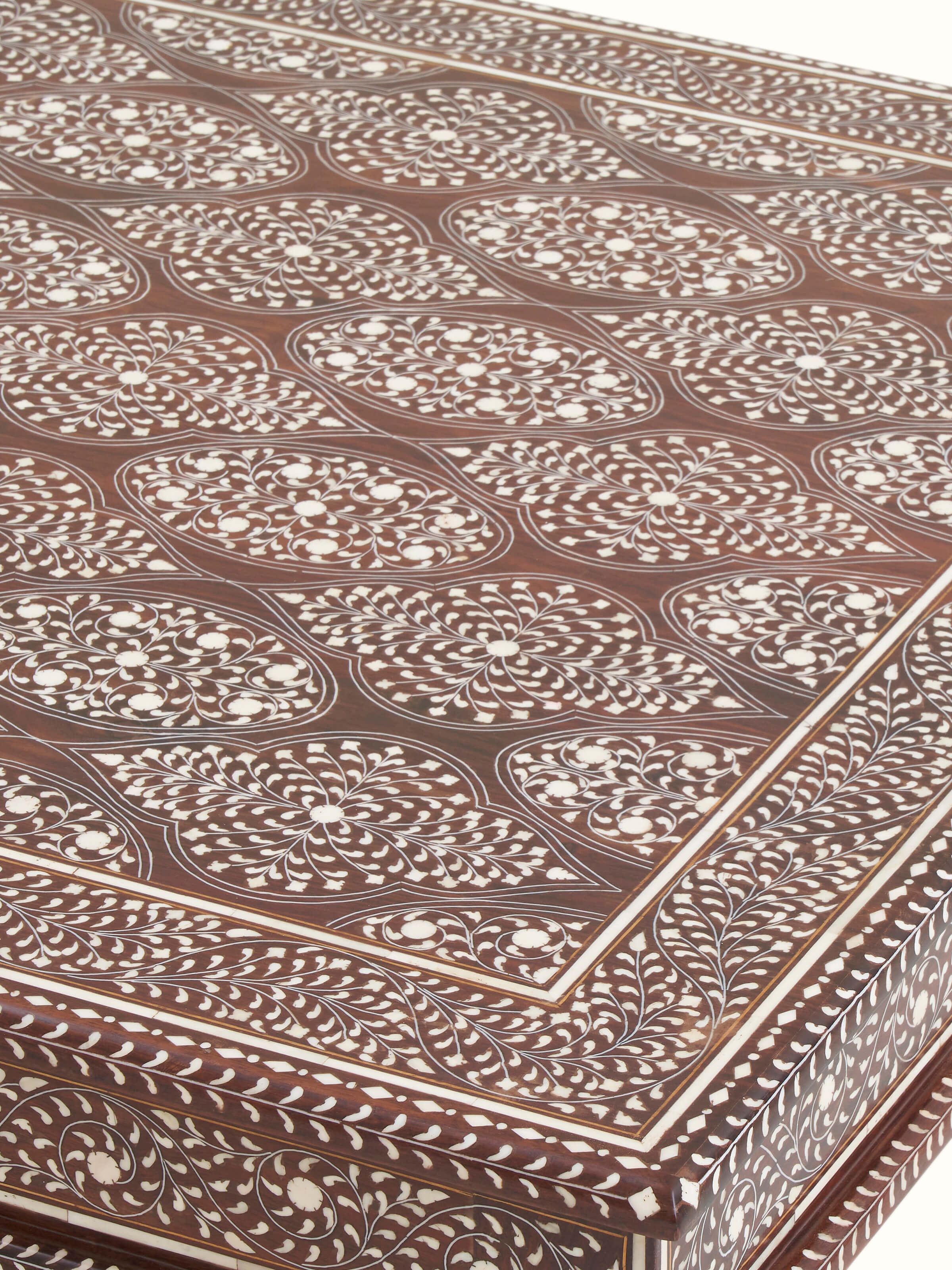 Base view of Bone Inlay Sheesham Wood Coffee Table highlighting the sturdy construction and elegant wood base.