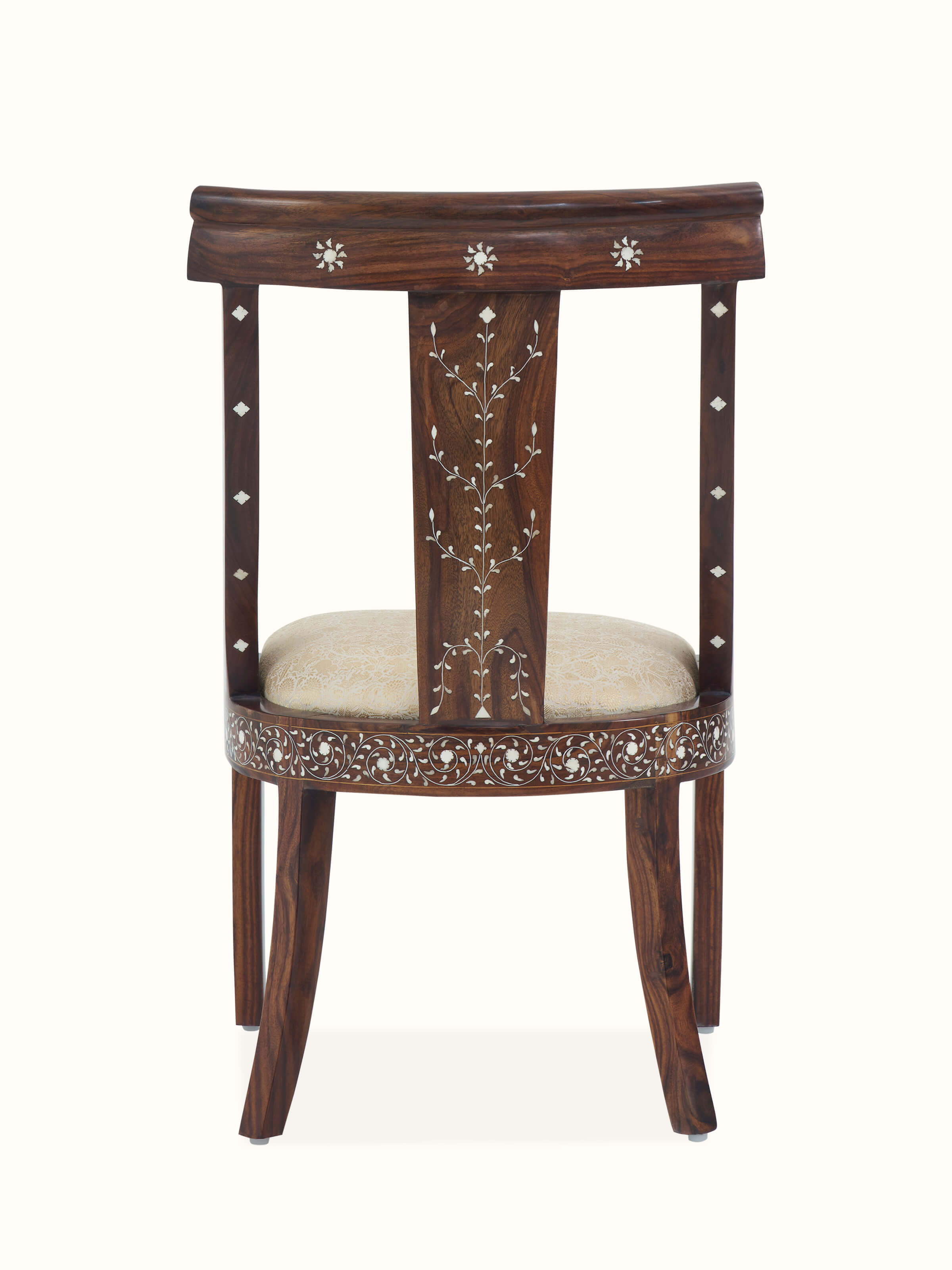 Angle view of Upholstered Sheesham Wood Bone Inlay Dining Chair, showcasing the elegant curves and design elements
