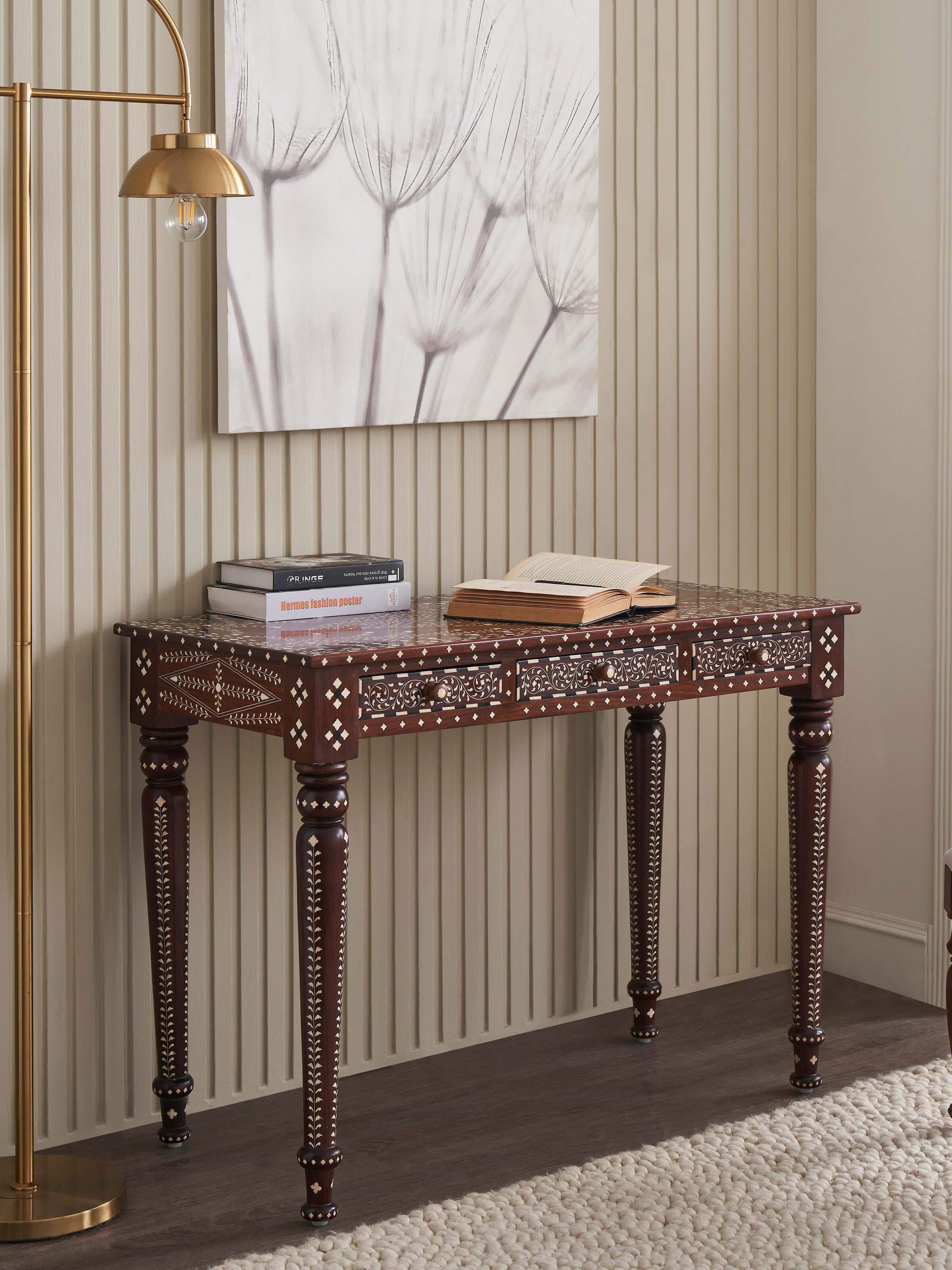 Side view of bone inlaid sheesham wood study table, highlighting the elegant craftsmanship and drawer handles.
