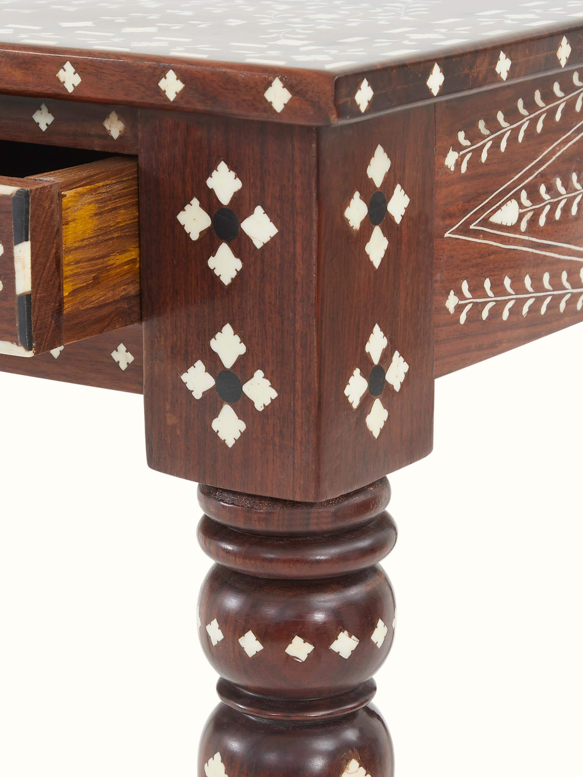 Detailed shot of the bone inlaid sheesham wood study table drawers, highlighting the craftsmanship and storage.