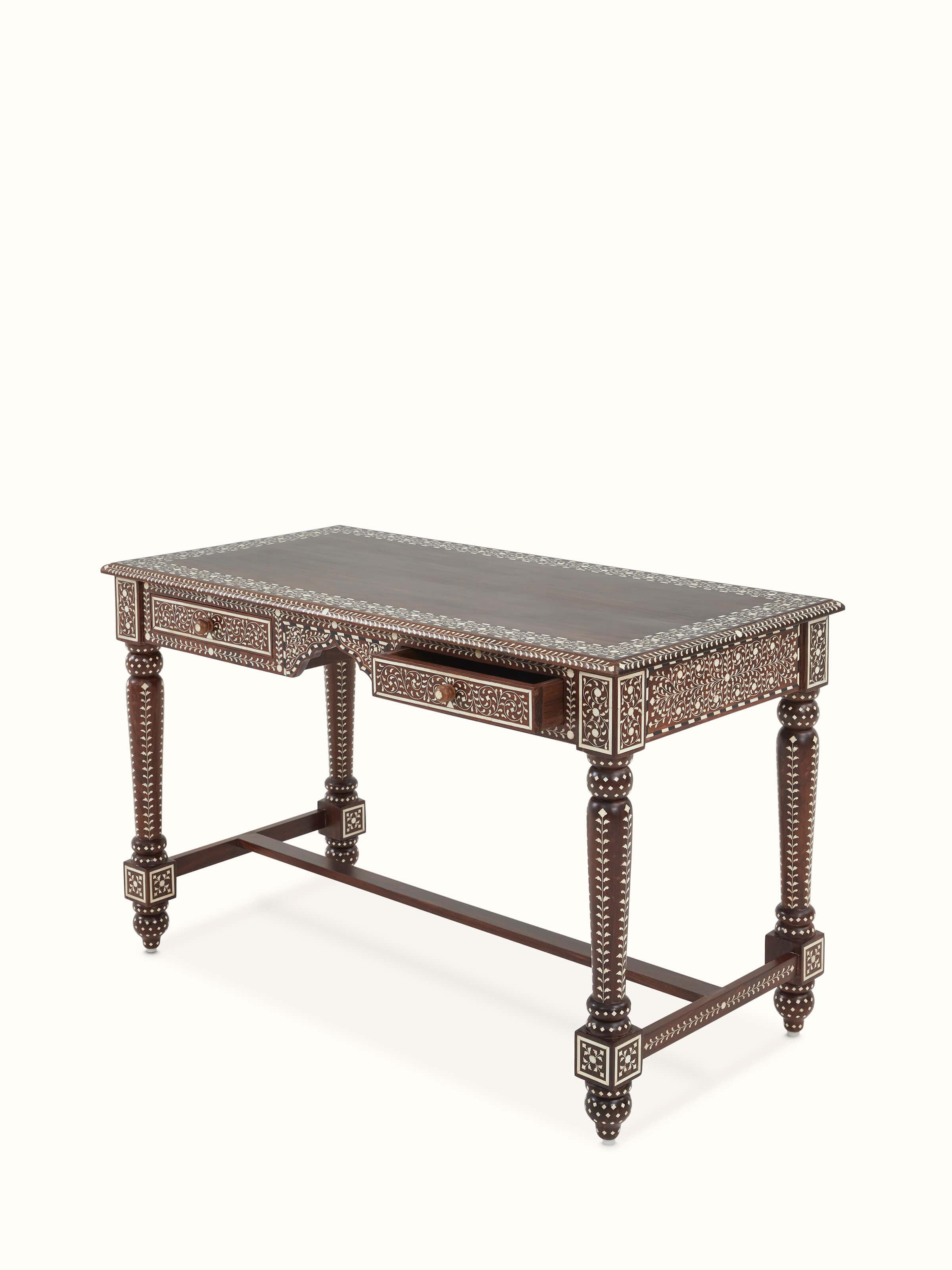 Angled top view of Swadesh Bone Inlay Sheesham Wood Study Table showing its spacious drawers and decorative details
