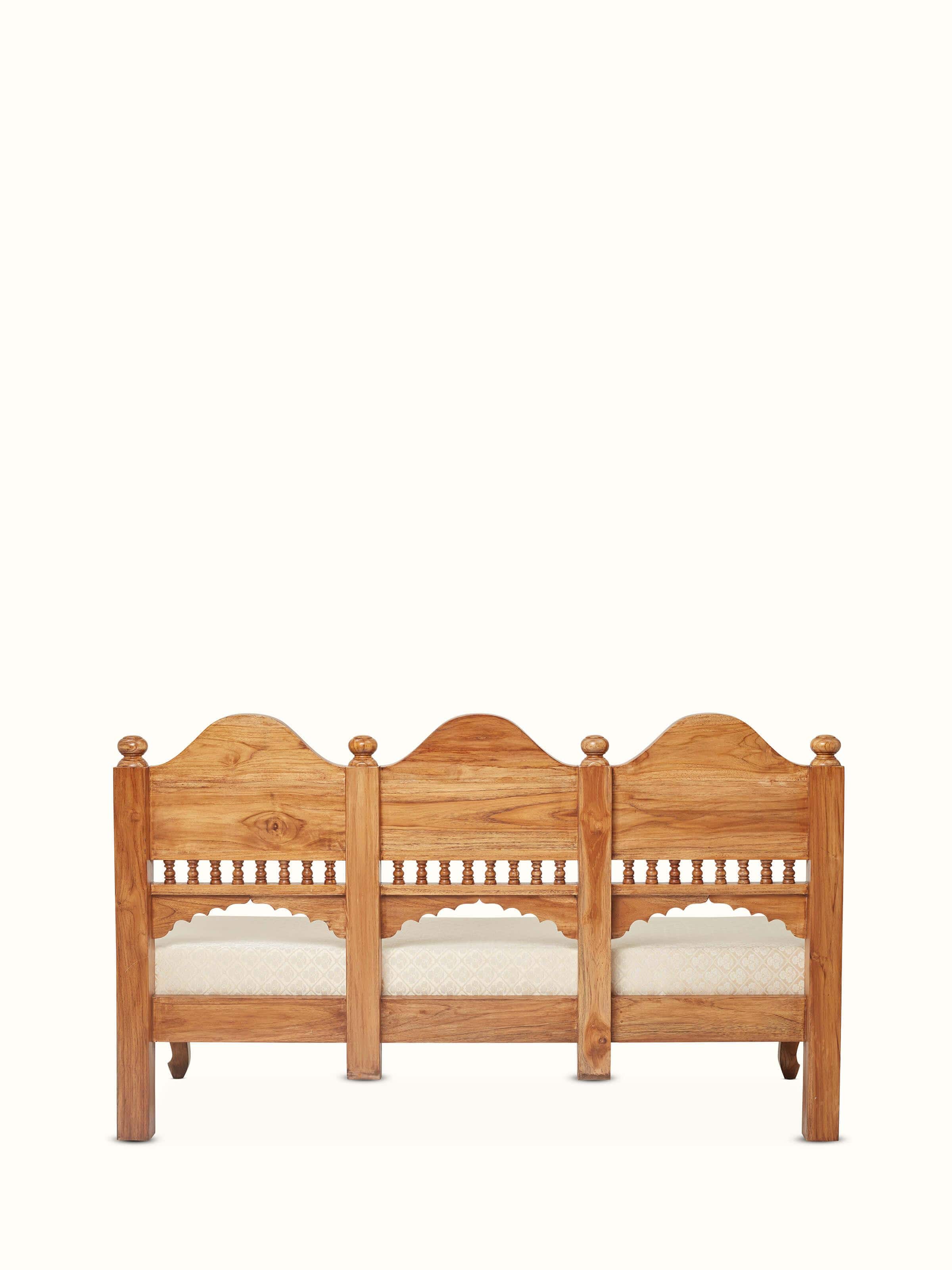 Top view of the upholstered Sheesham wood sofa, emphasizing the carved woodwork and cushioned seating area