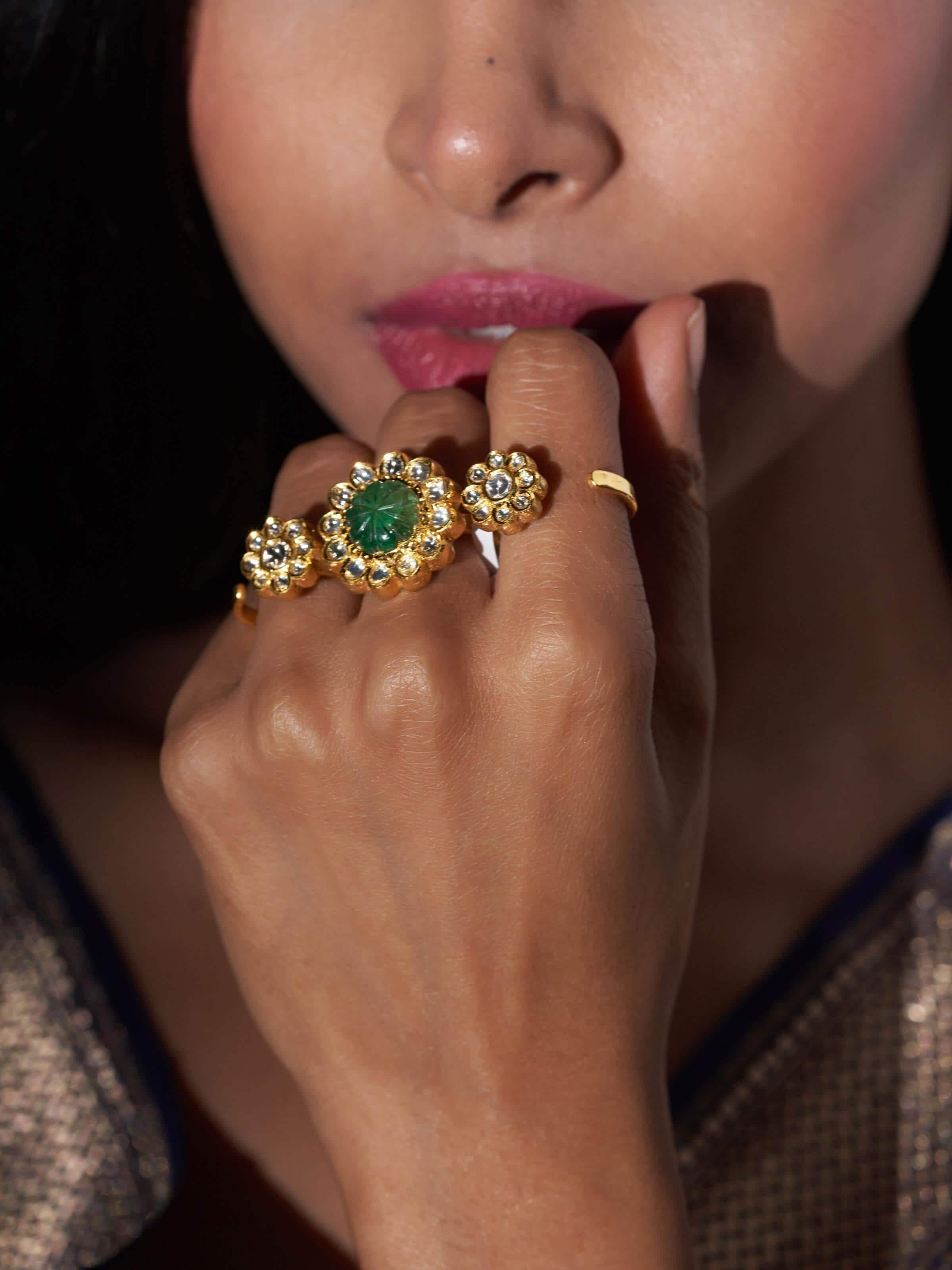 Close-up view of Jadau 18 Karat Gold 3-Finger Ring featuring intricate design and luxurious gold finish