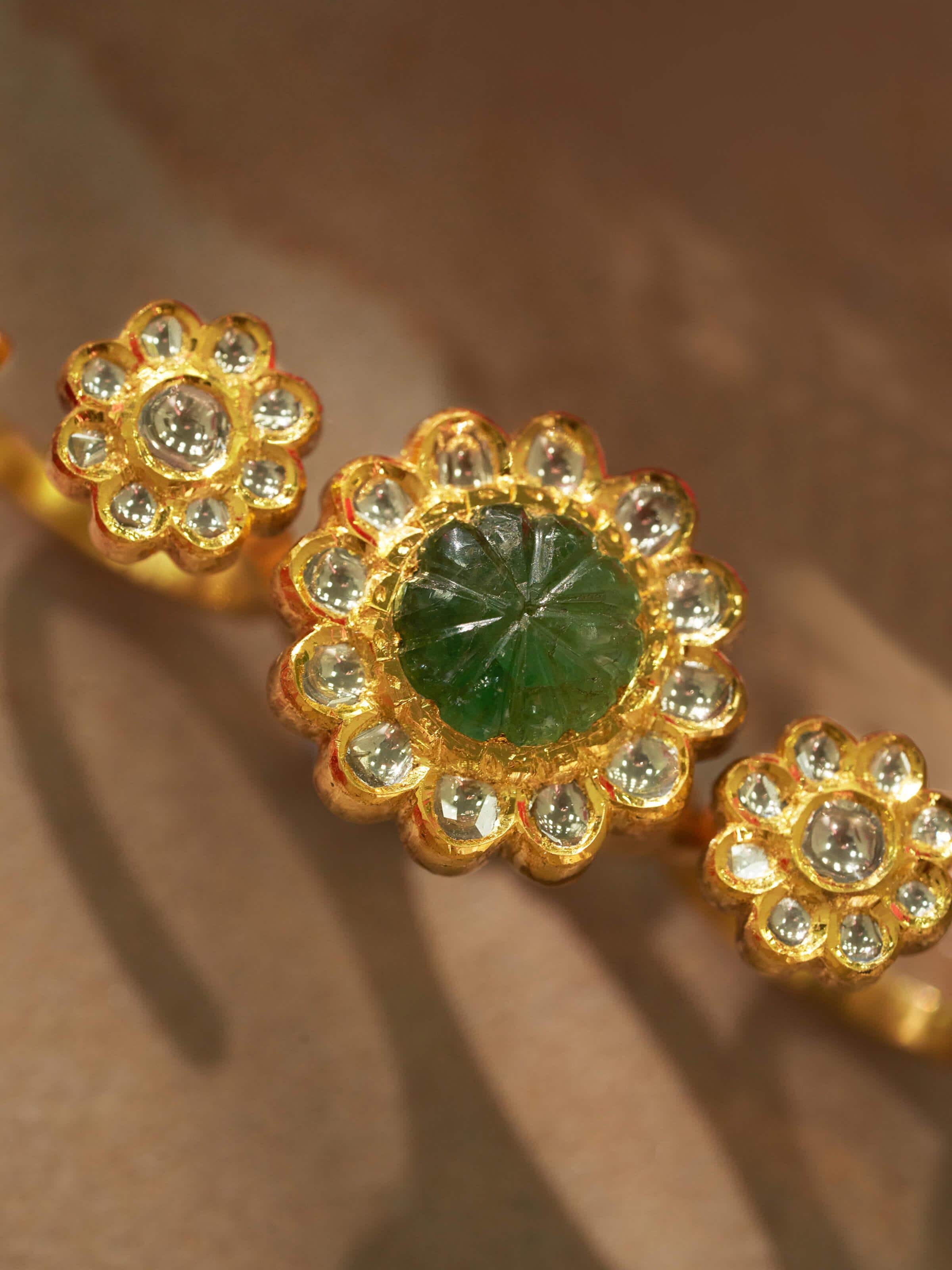 Detailed view of Jadau 18 Karat Gold 3-Finger Ring emphasizing the elegant Jadau work and gold detailing