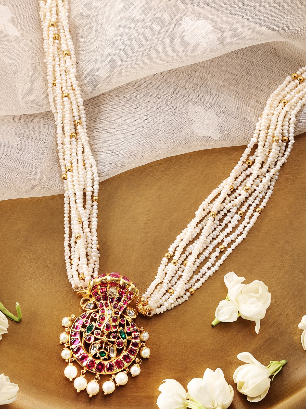 Side view of Kundala Velai 22 karat gold collar necklace showcasing its elegant curves and detailed craftsmanship.