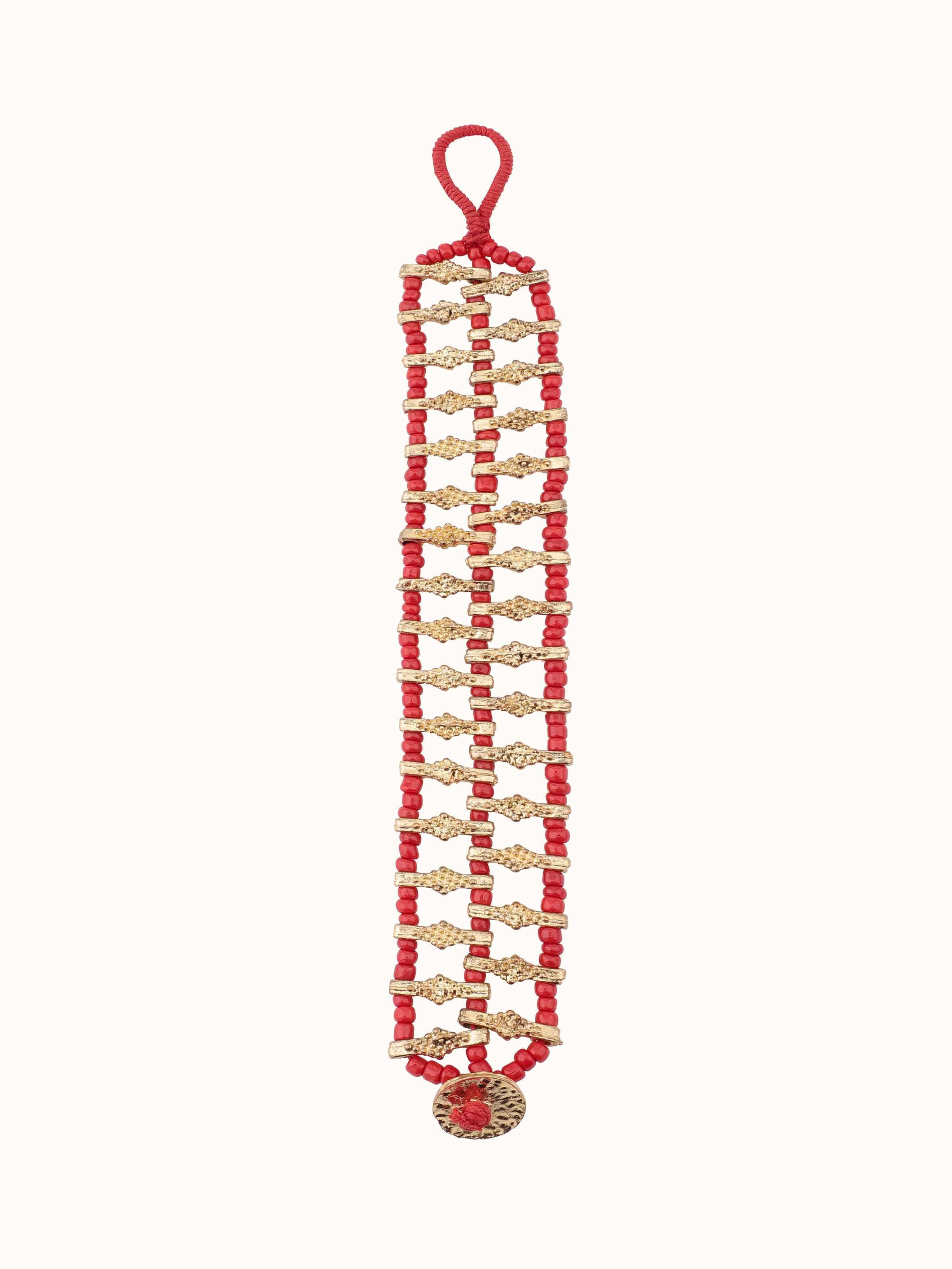 Front view of handcrafted flexible bracelet featuring detailed metalwork.