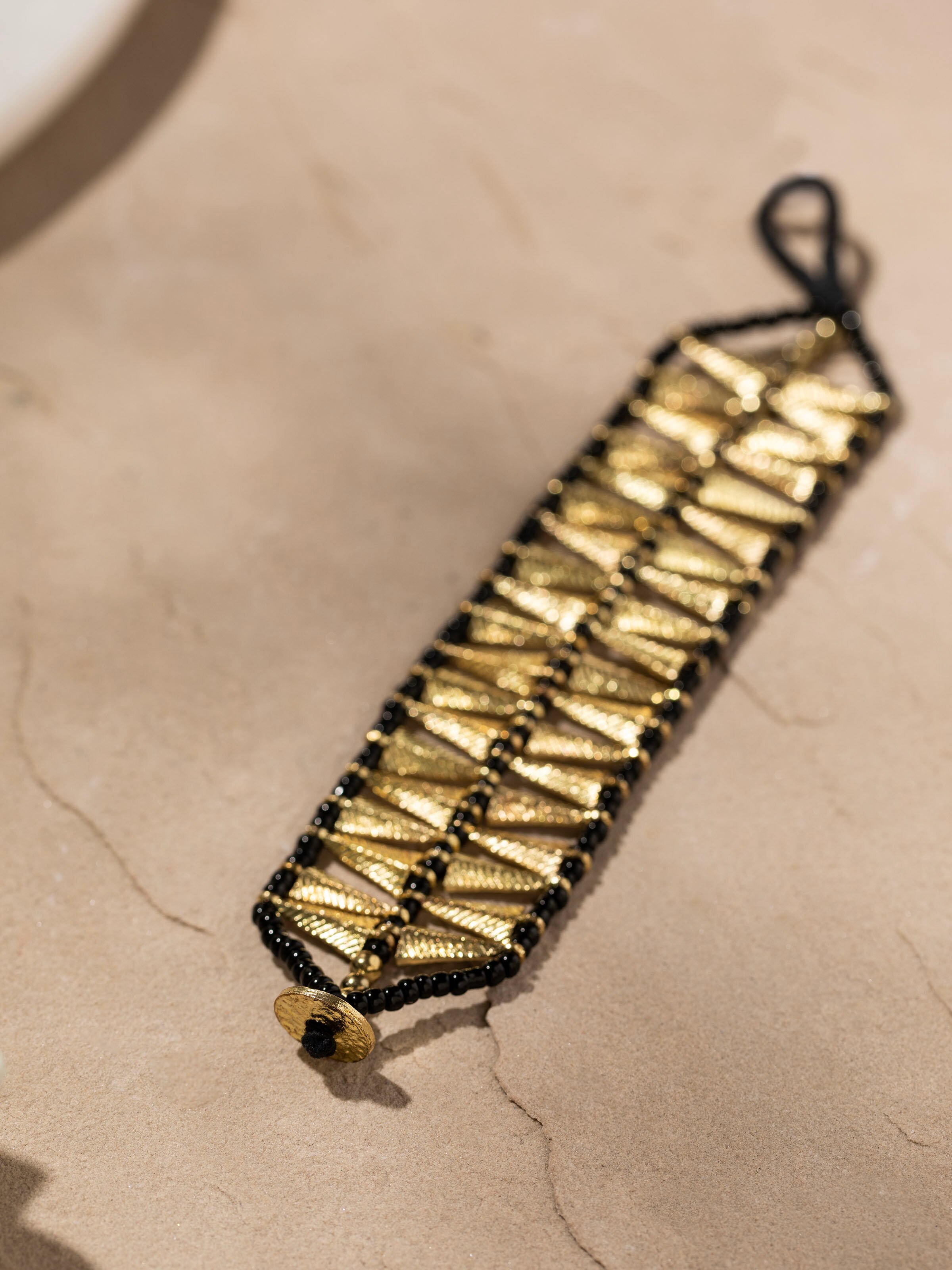 Detailed view of Handcrafted Flexible Bracelet from a distance showcasing its full design and craftsmanship.
