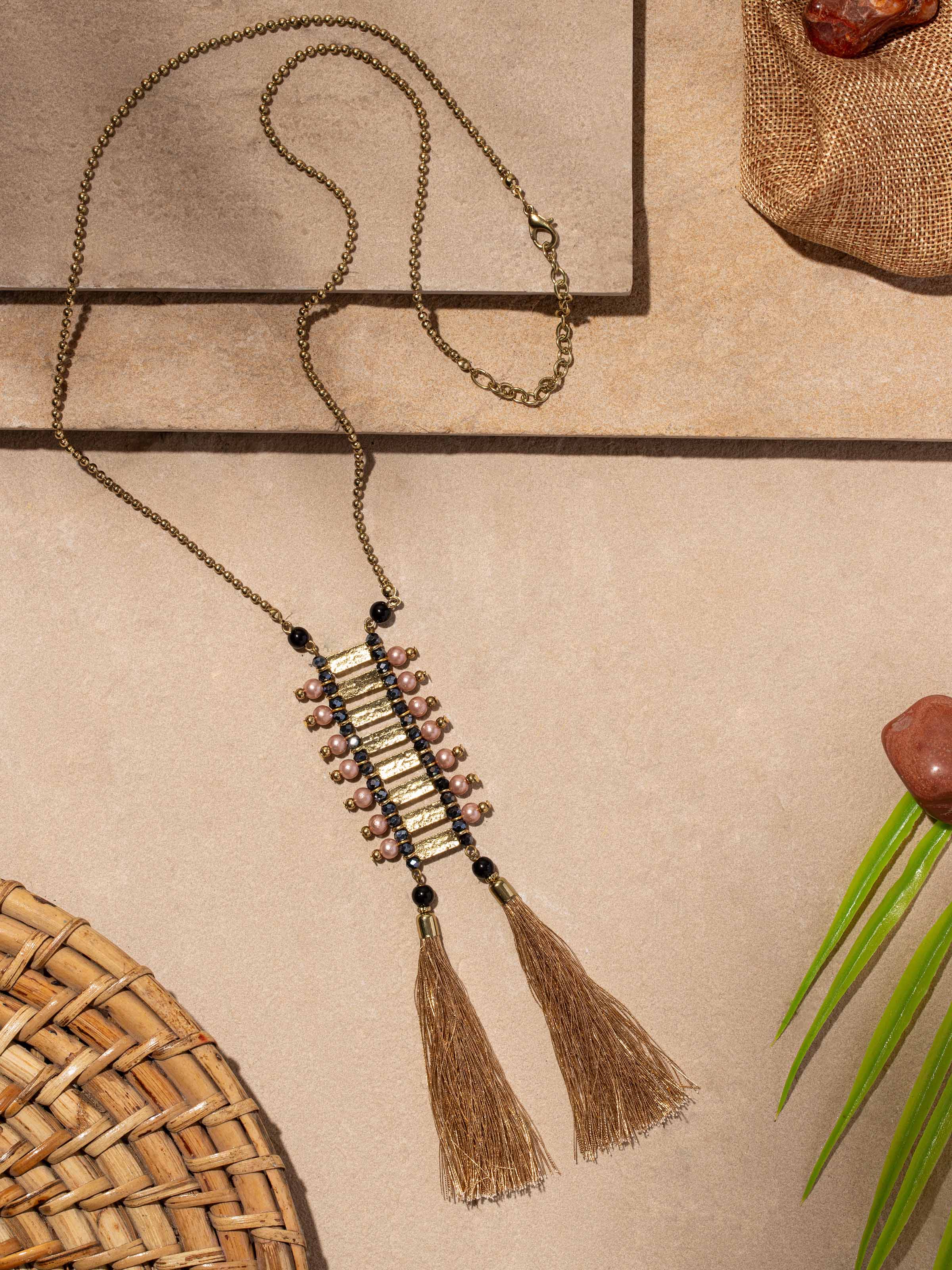 Side view of Handcrafted Long Necklace highlighting the unique design and layering of handcrafted elements.