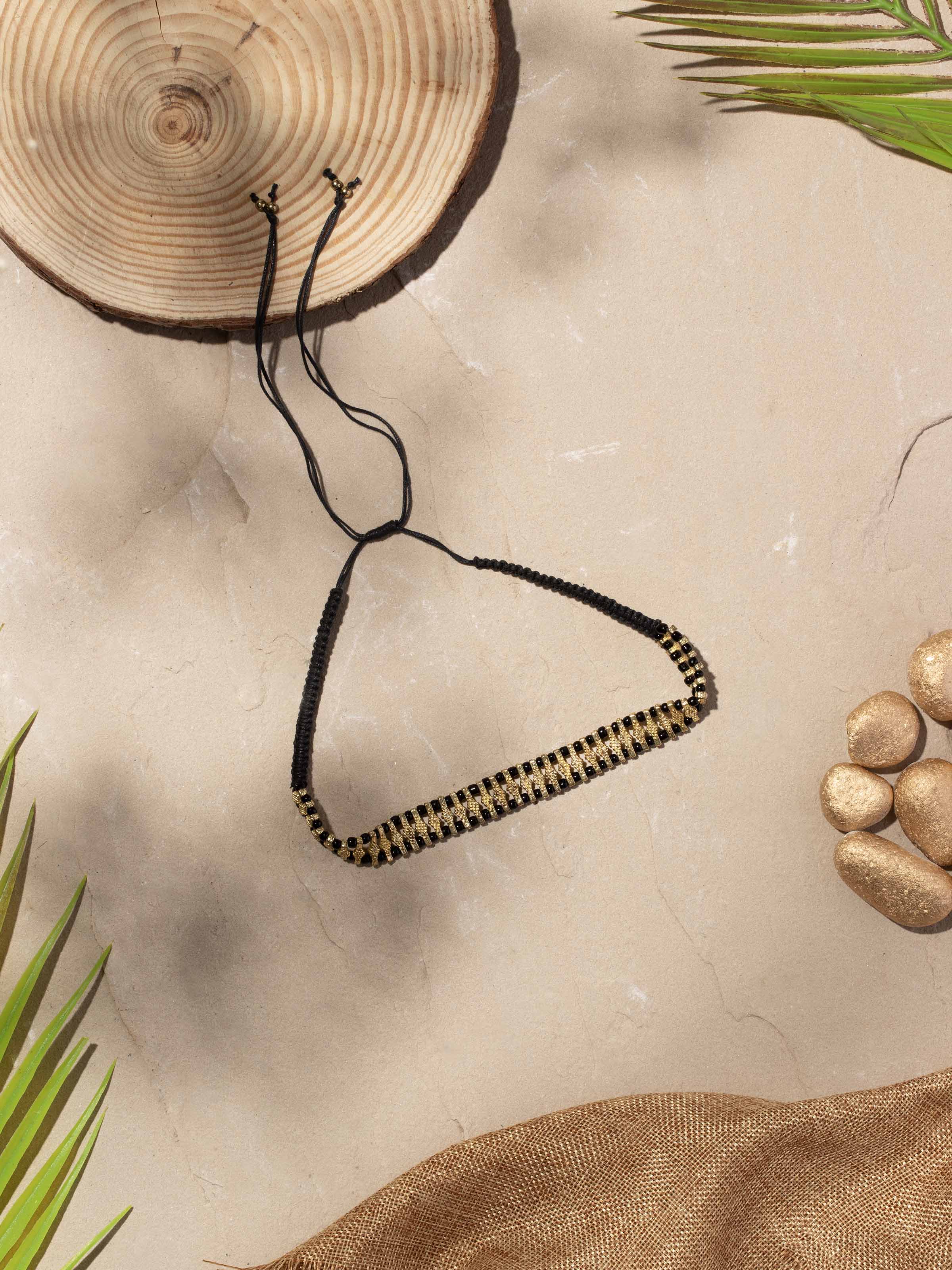 Side view of Handcrafted collar necklace highlighting its intricate details and handcrafted elegance