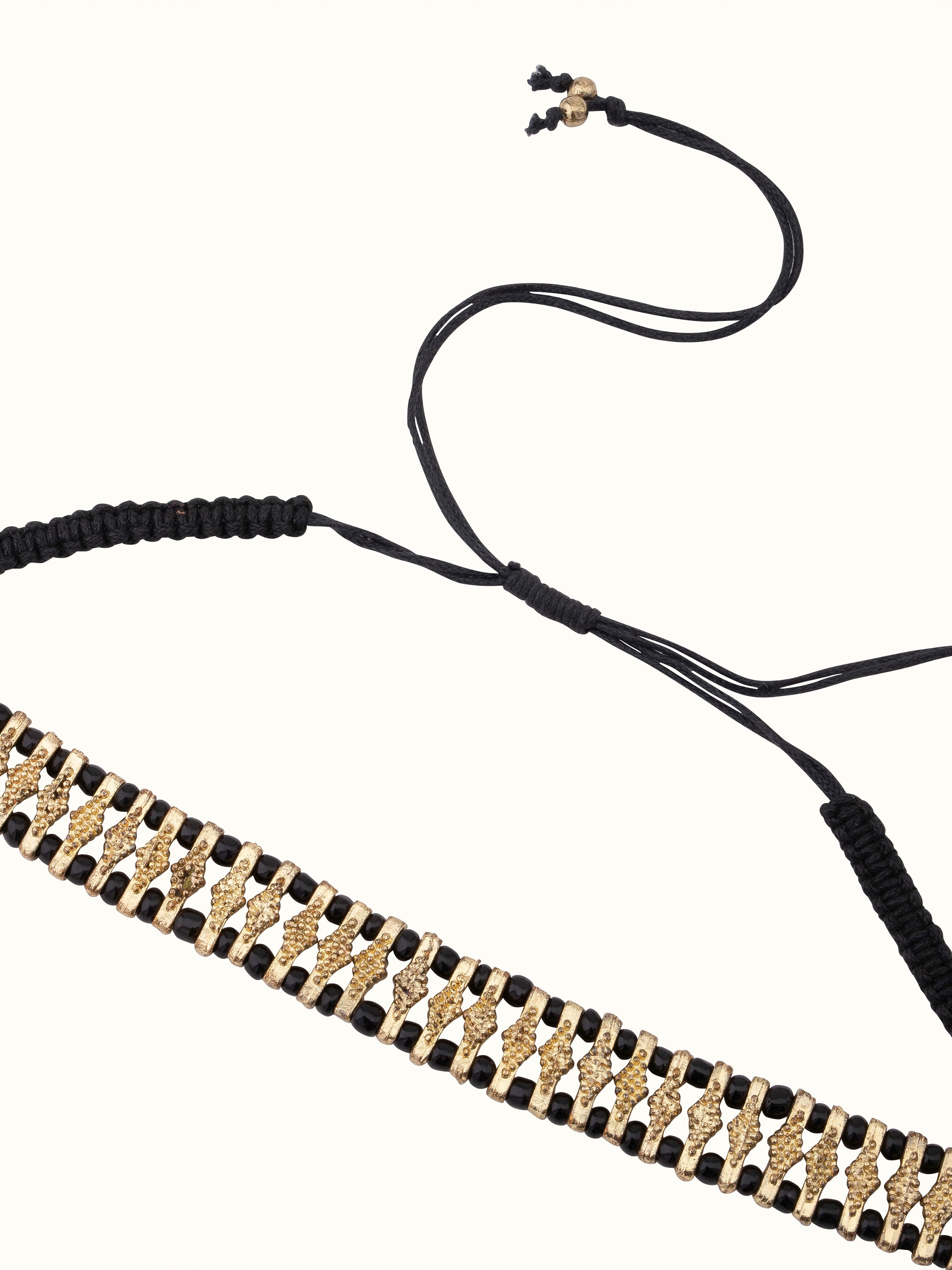 Angled view of Handcrafted collar necklace emphasizing its distinctive style and detailed craftsmanship