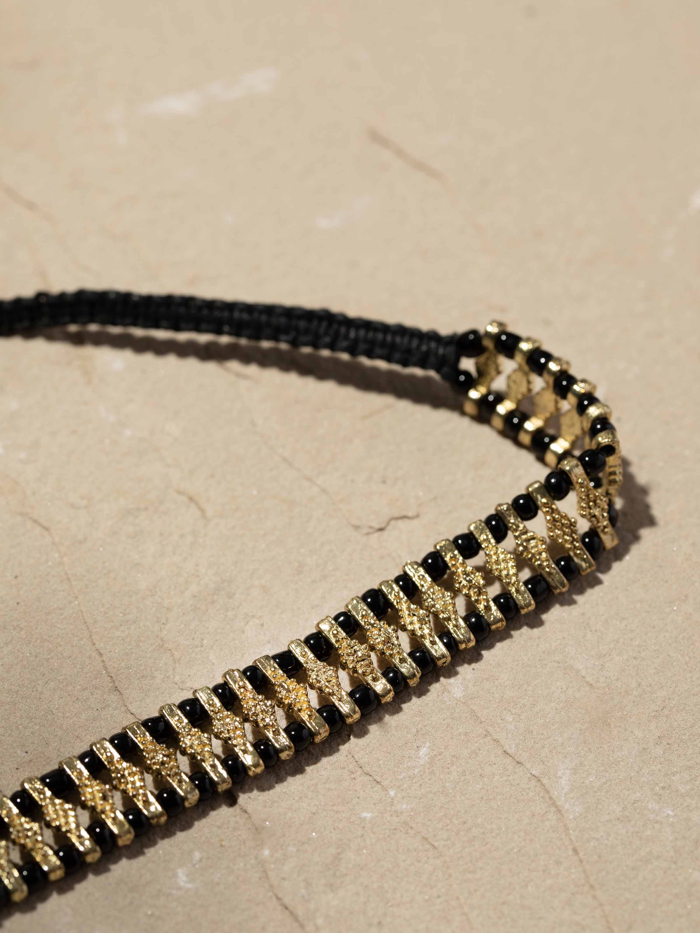 Detailed front view of Handcrafted collar necklace showcasing its unique design and high-quality materials