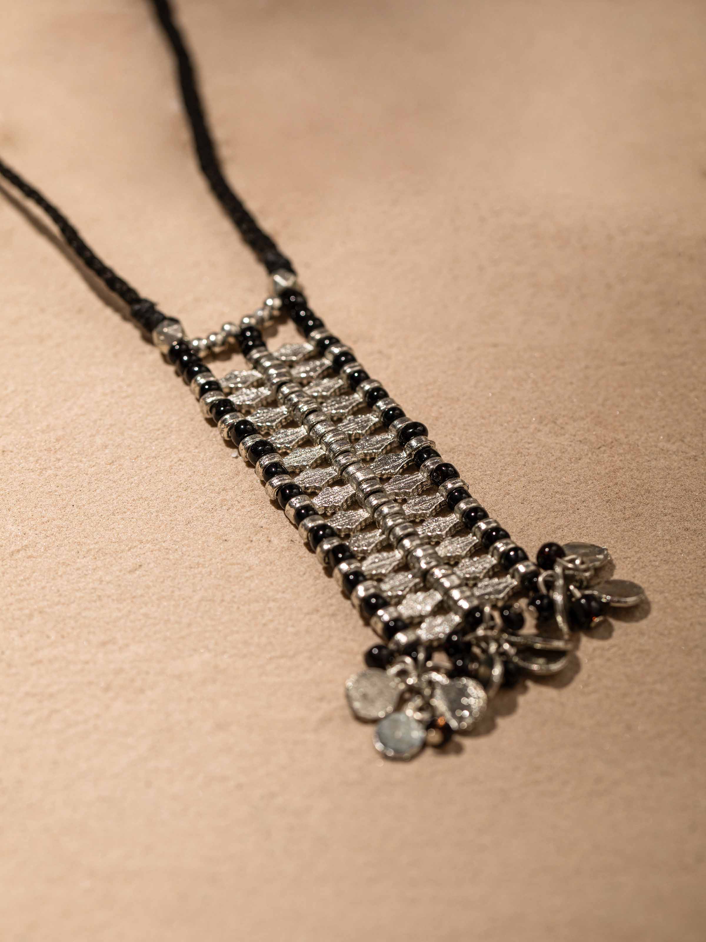 Detailed view of Handcrafted Long Necklace focusing on the fine craftsmanship and design elements.