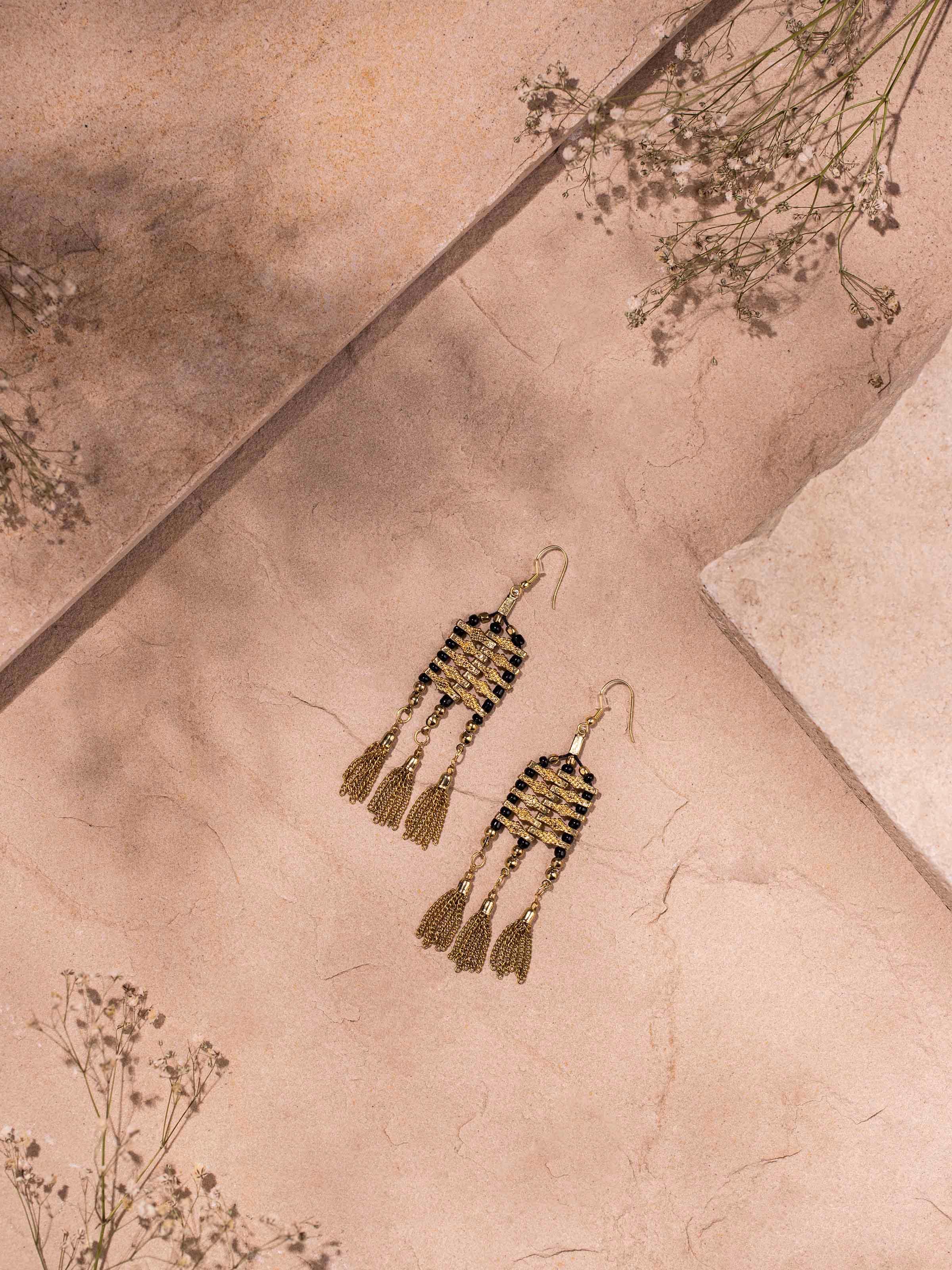 Side view of Handcrafted Drop Earrings highlighting the artisanal design and craftsmanship.