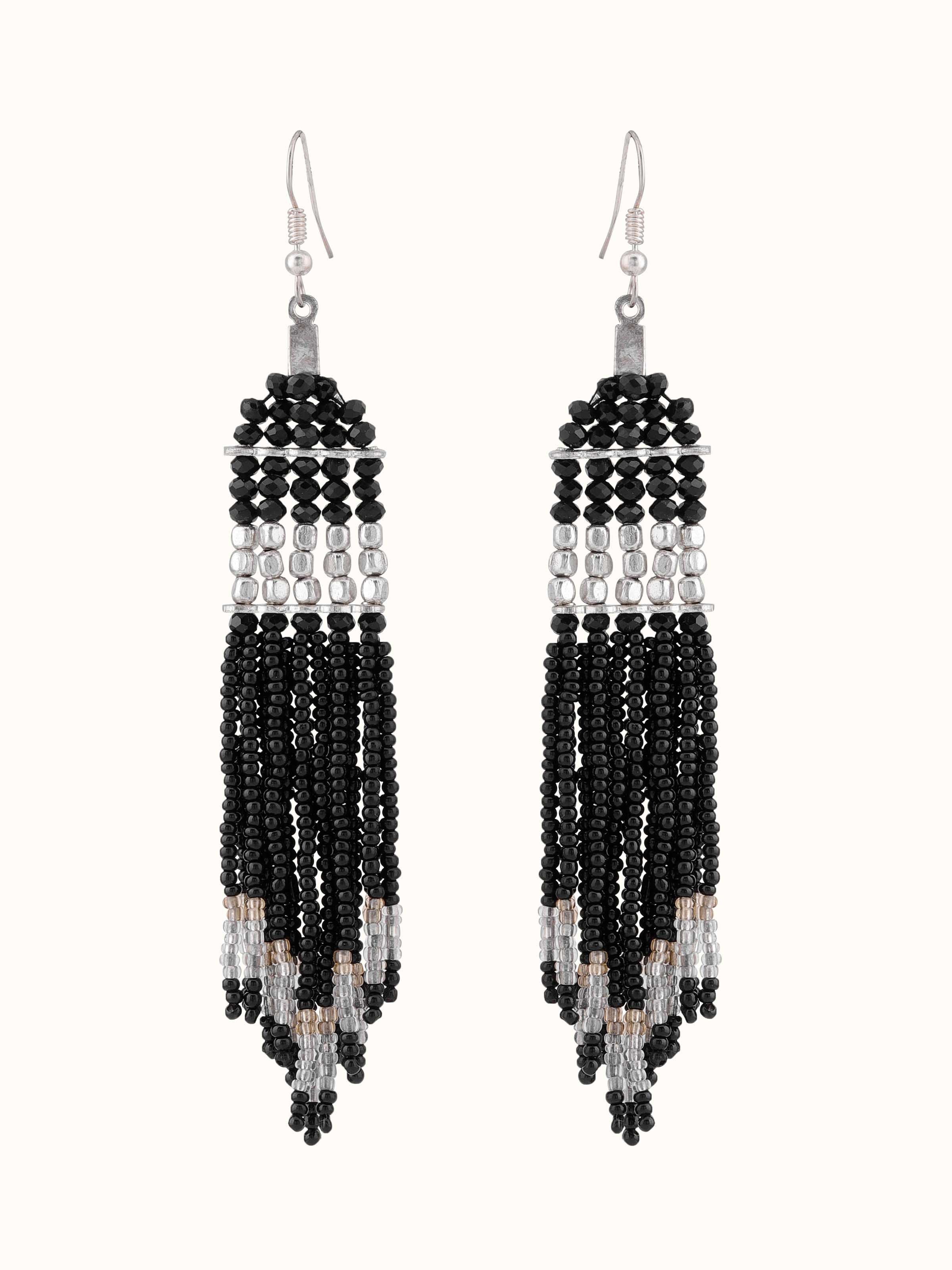 Angled view of Jadau 18 Karat Gold Chandbalis emphasizing the intricate gold work and design.