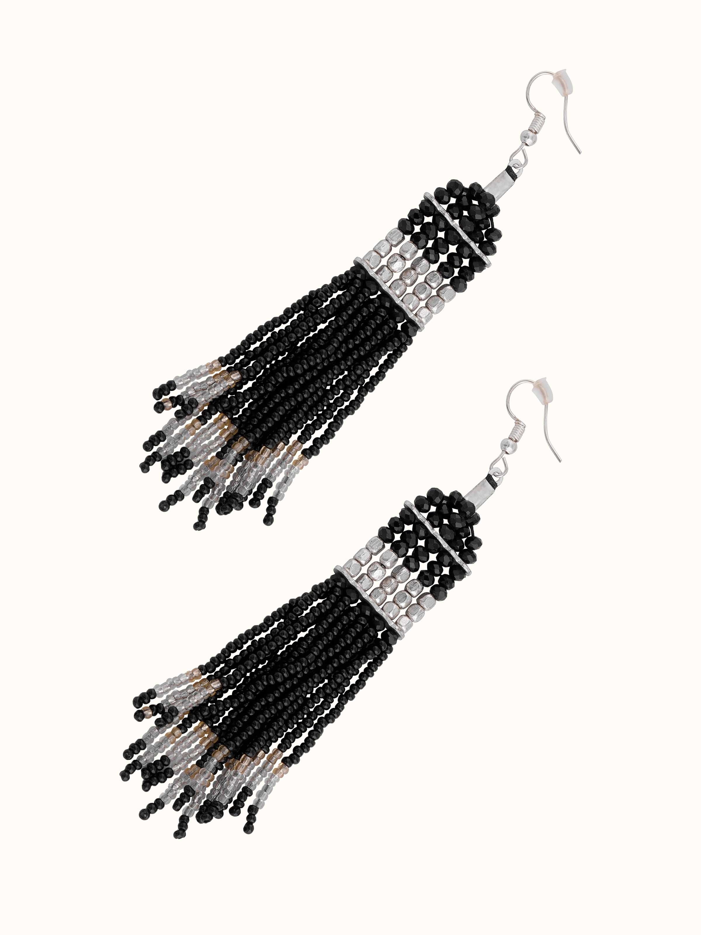 Side view of Handcrafted Drop Earrings showing the detailed craftsmanship and hanging design.