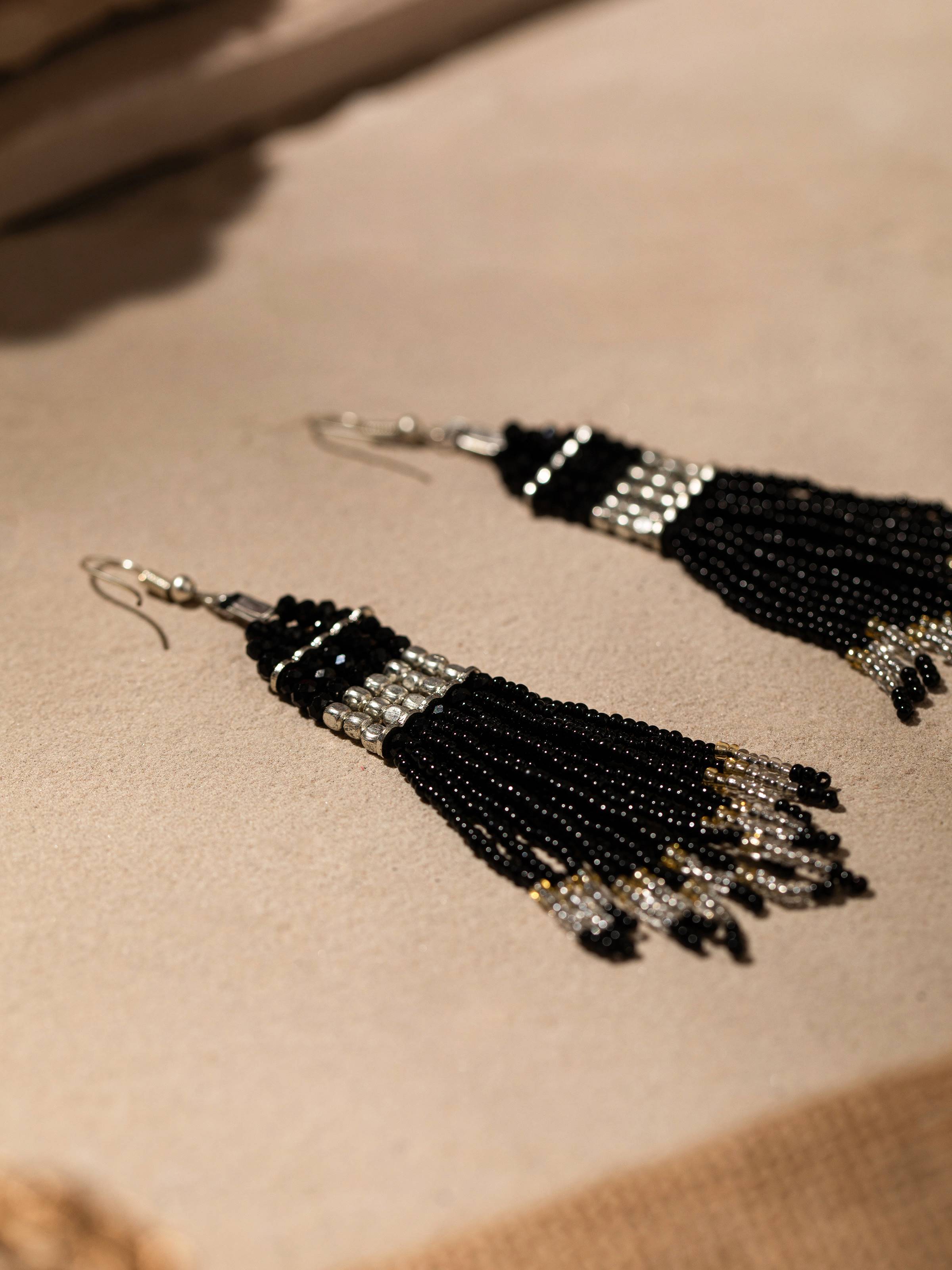 Back view of Handcrafted Drop Earrings displaying the earring hooks and detailed design.