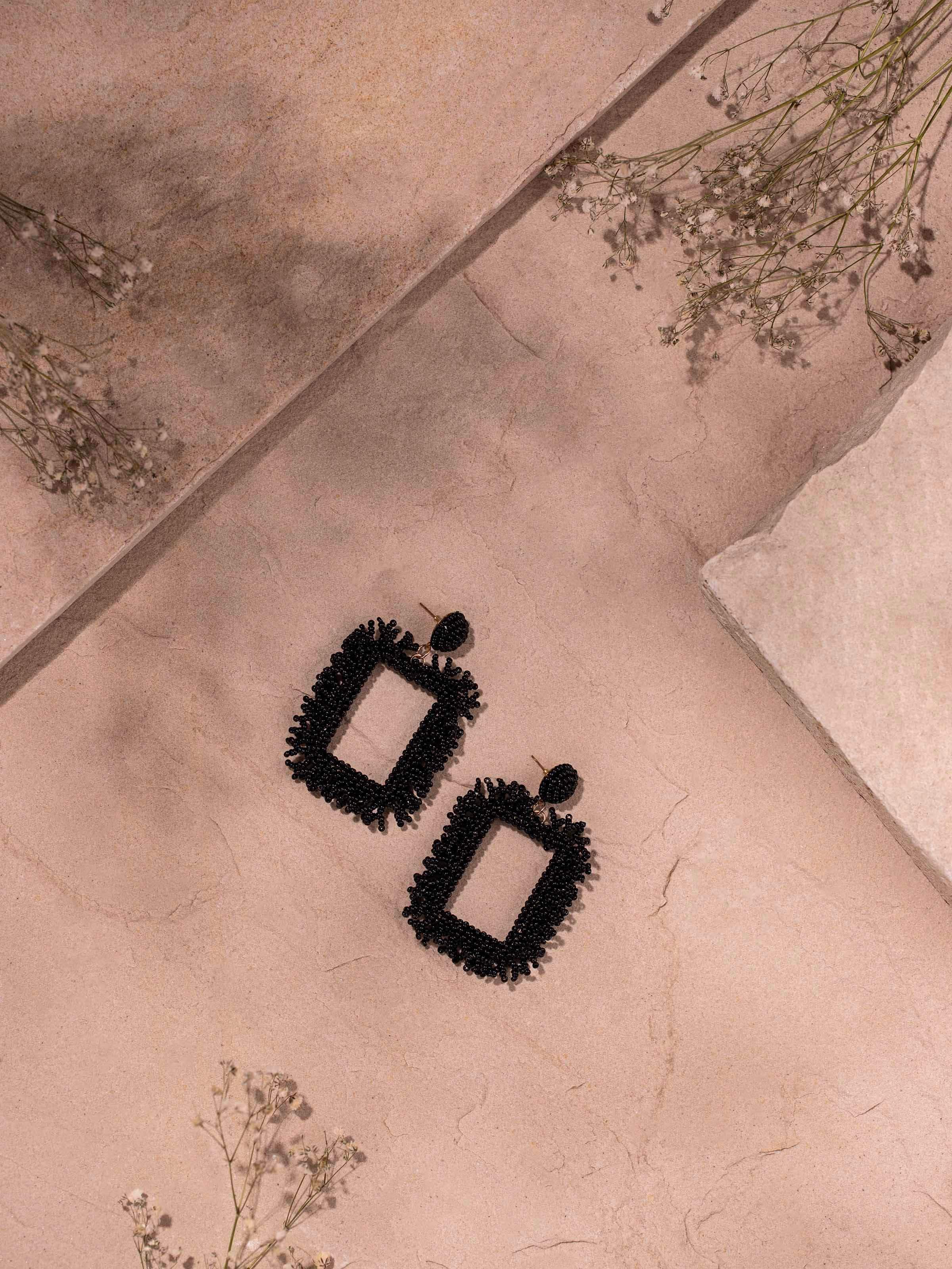 Close-up of Handcrafted Drop Earrings showcasing their fine craftsmanship and detailed design.