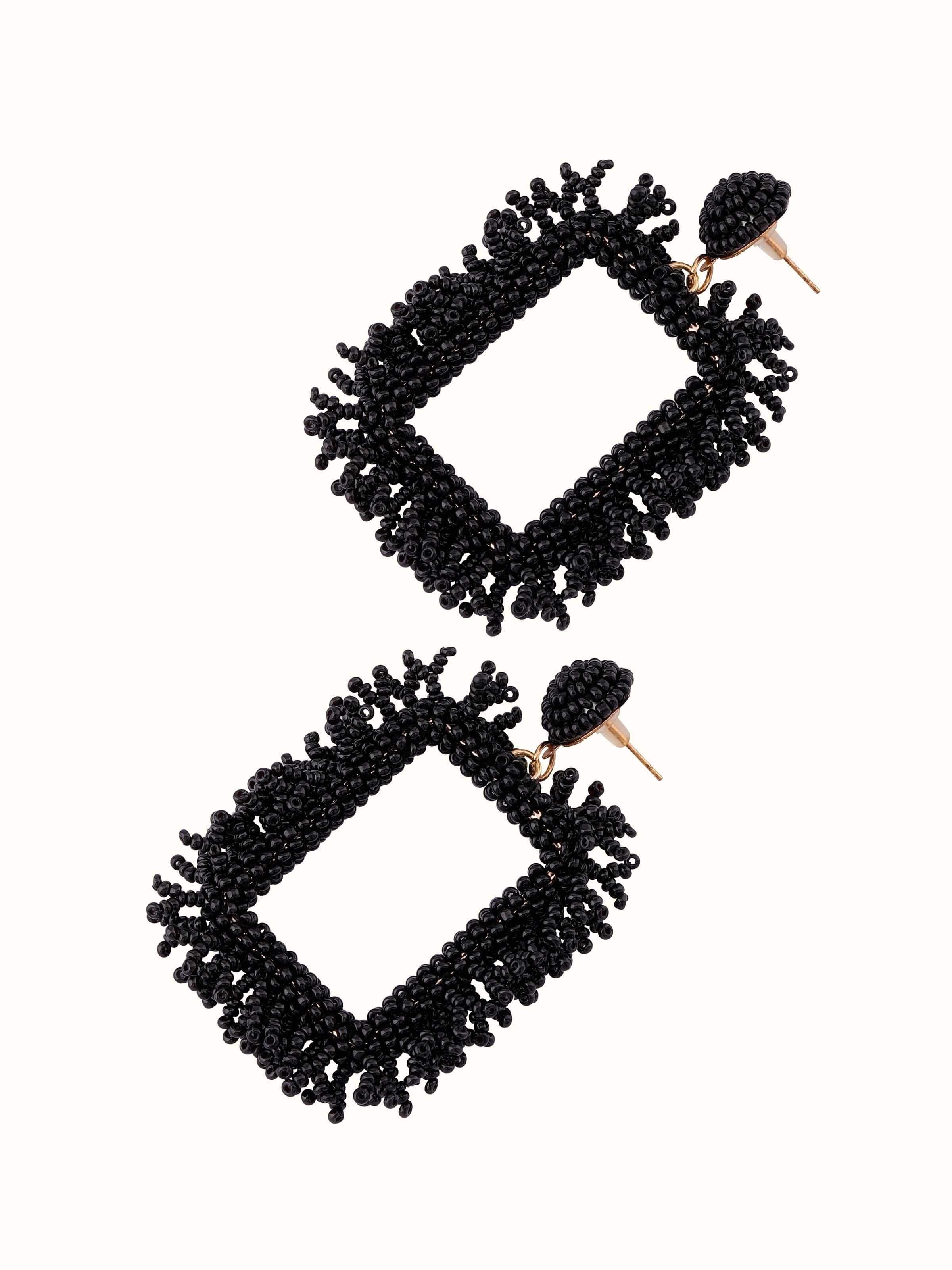 Front view of Handcrafted Drop Earrings emphasizing their stylish and sophisticated appearance.