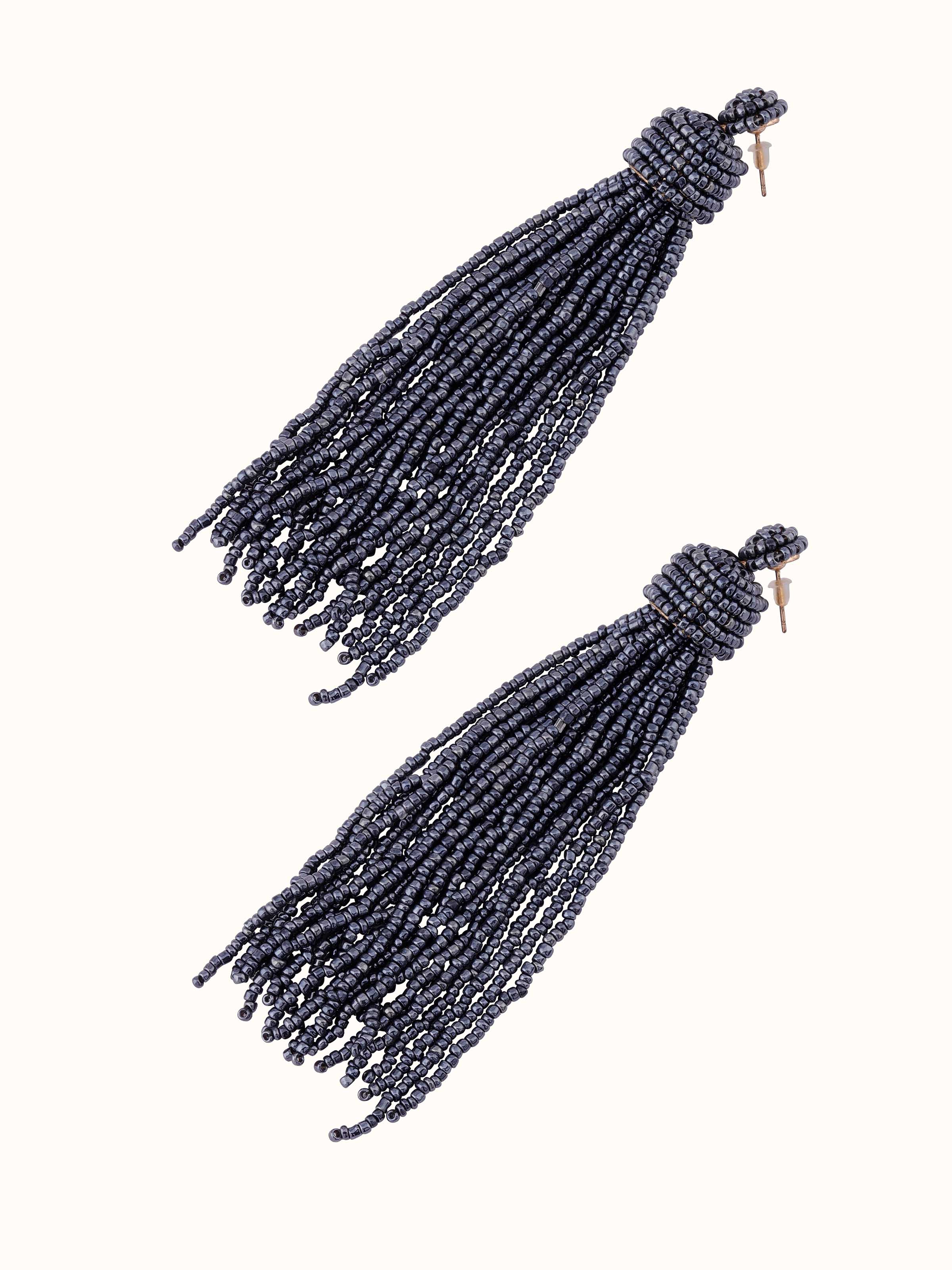 Angled view of Handcrafted Drop Earrings displaying their stylish and artistic features.