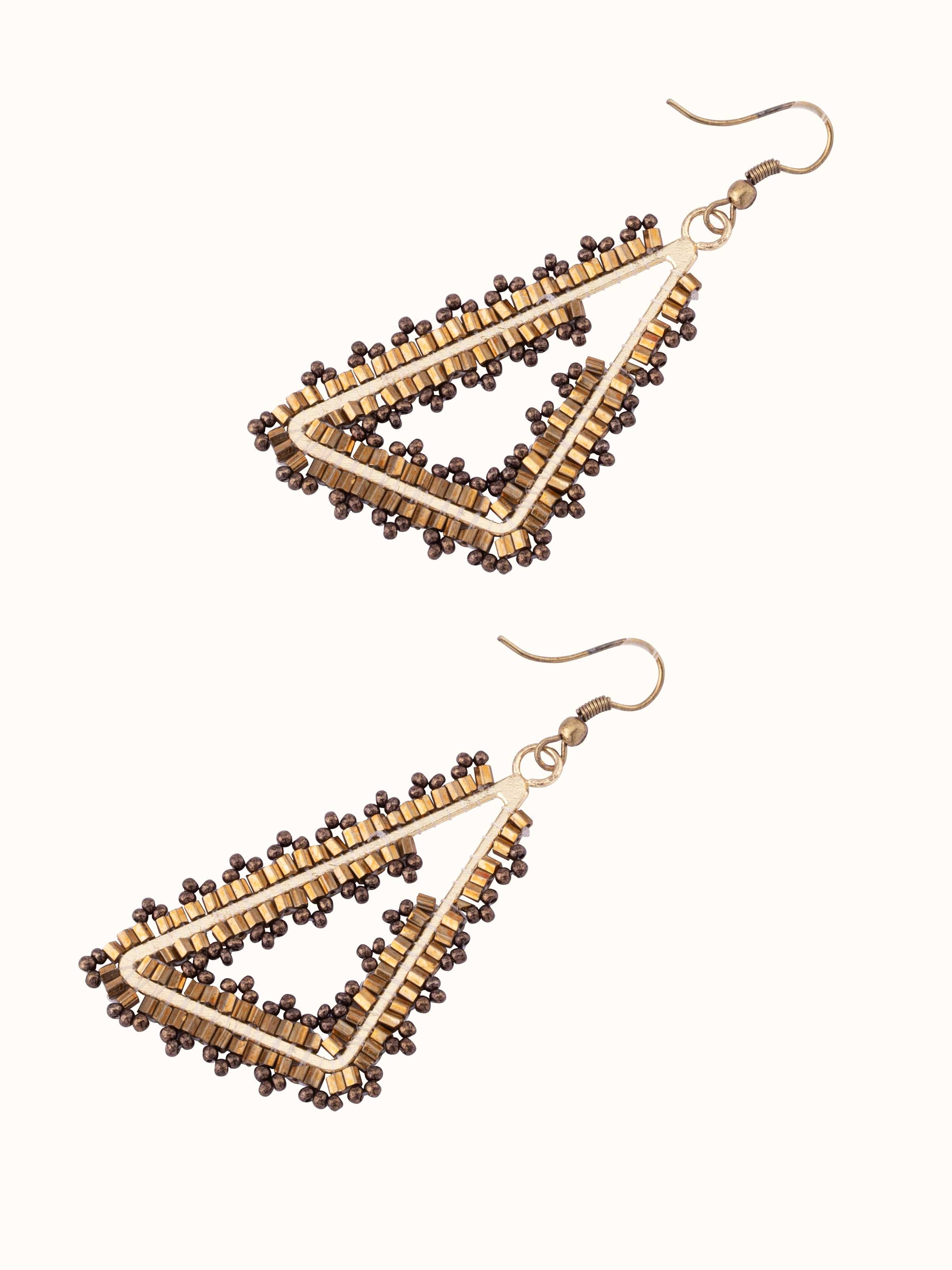 Close-up of Handcrafted drop earrings showing detailed workmanship and high-quality materials.
