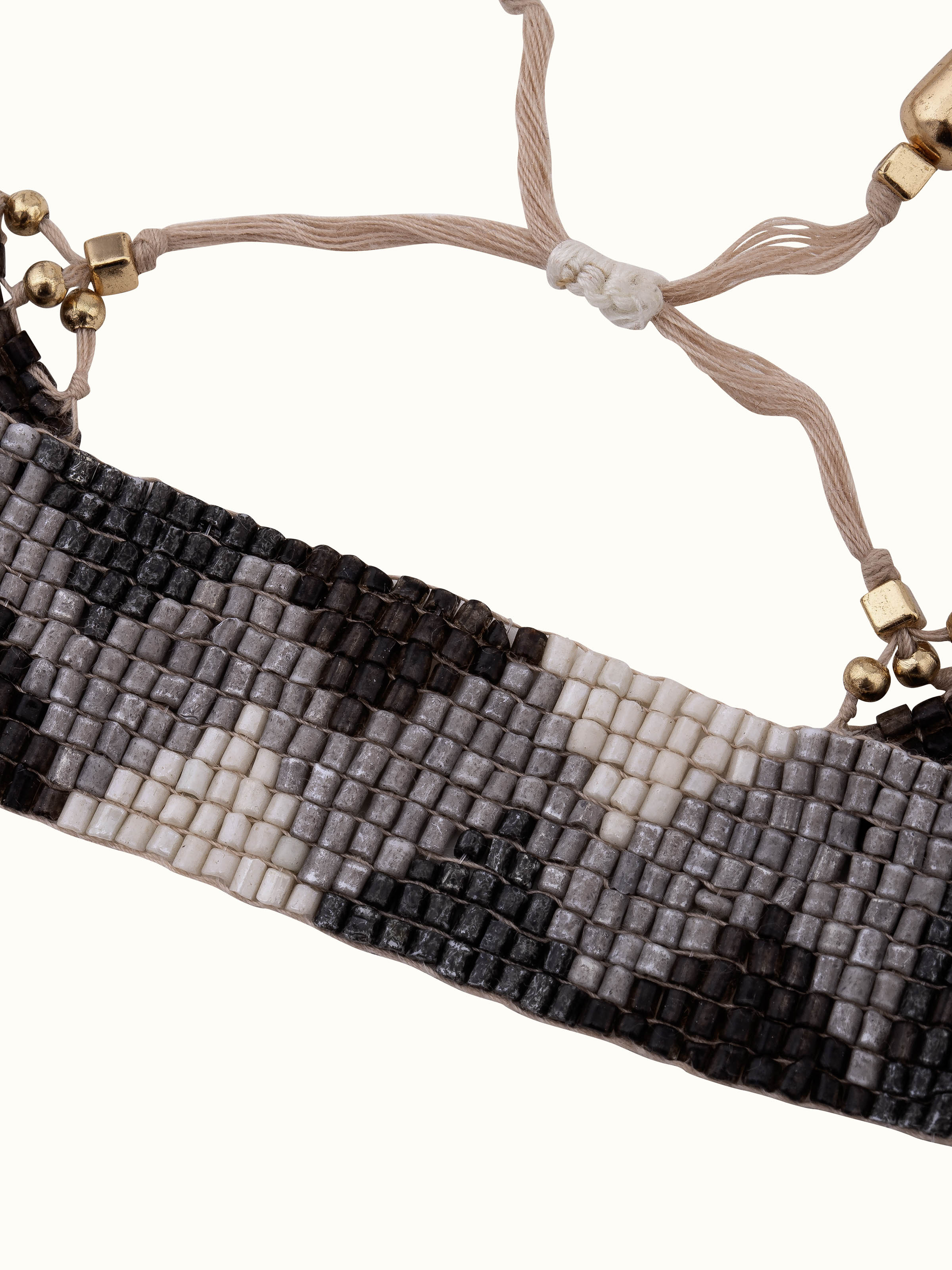 Angled view of Handcrafted Flexible Bracelet highlighting its unique design and flexibility.