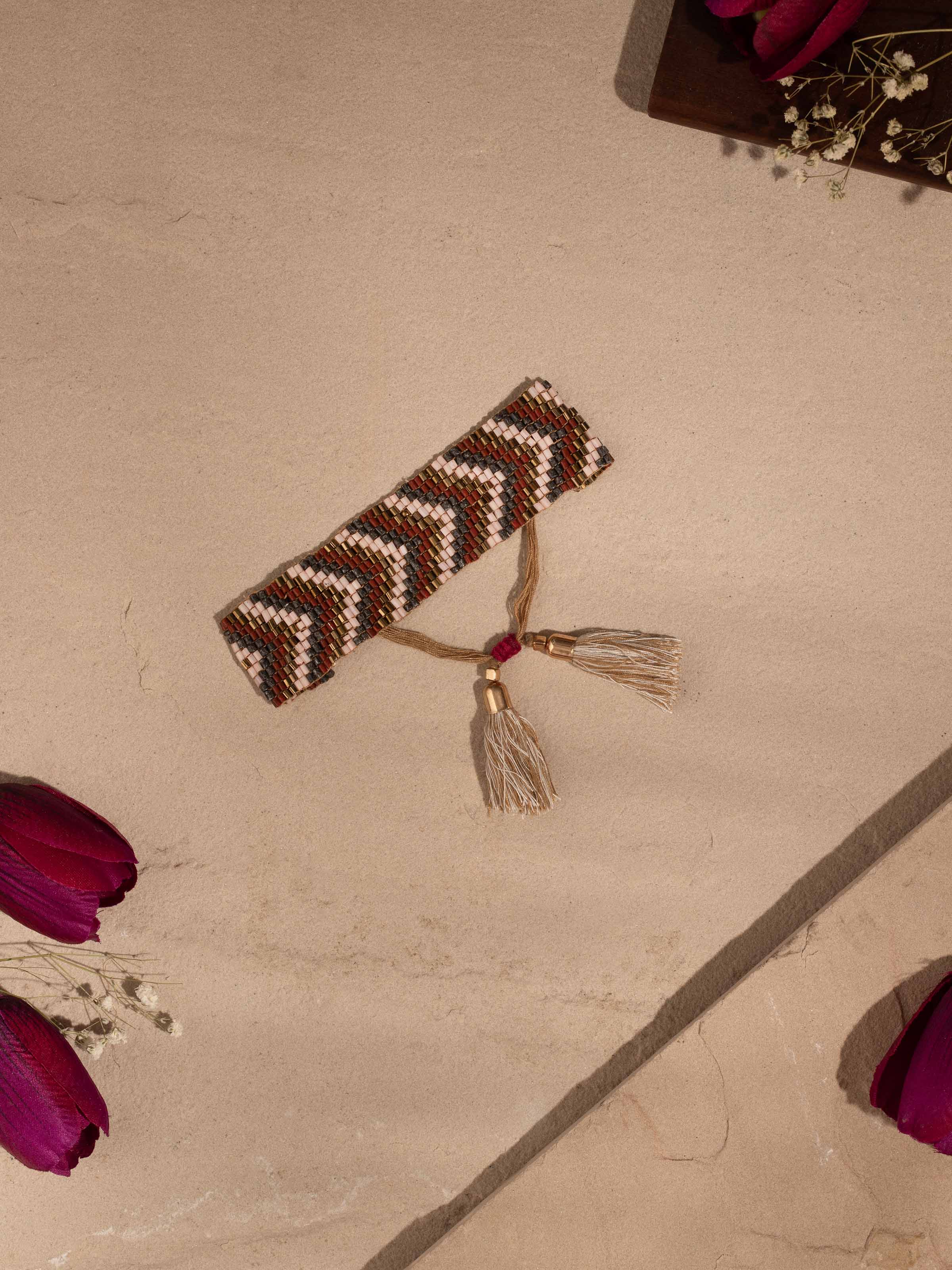 Close-up view of handcrafted flexible bracelet highlighting the texture and detailed craftsmanship.