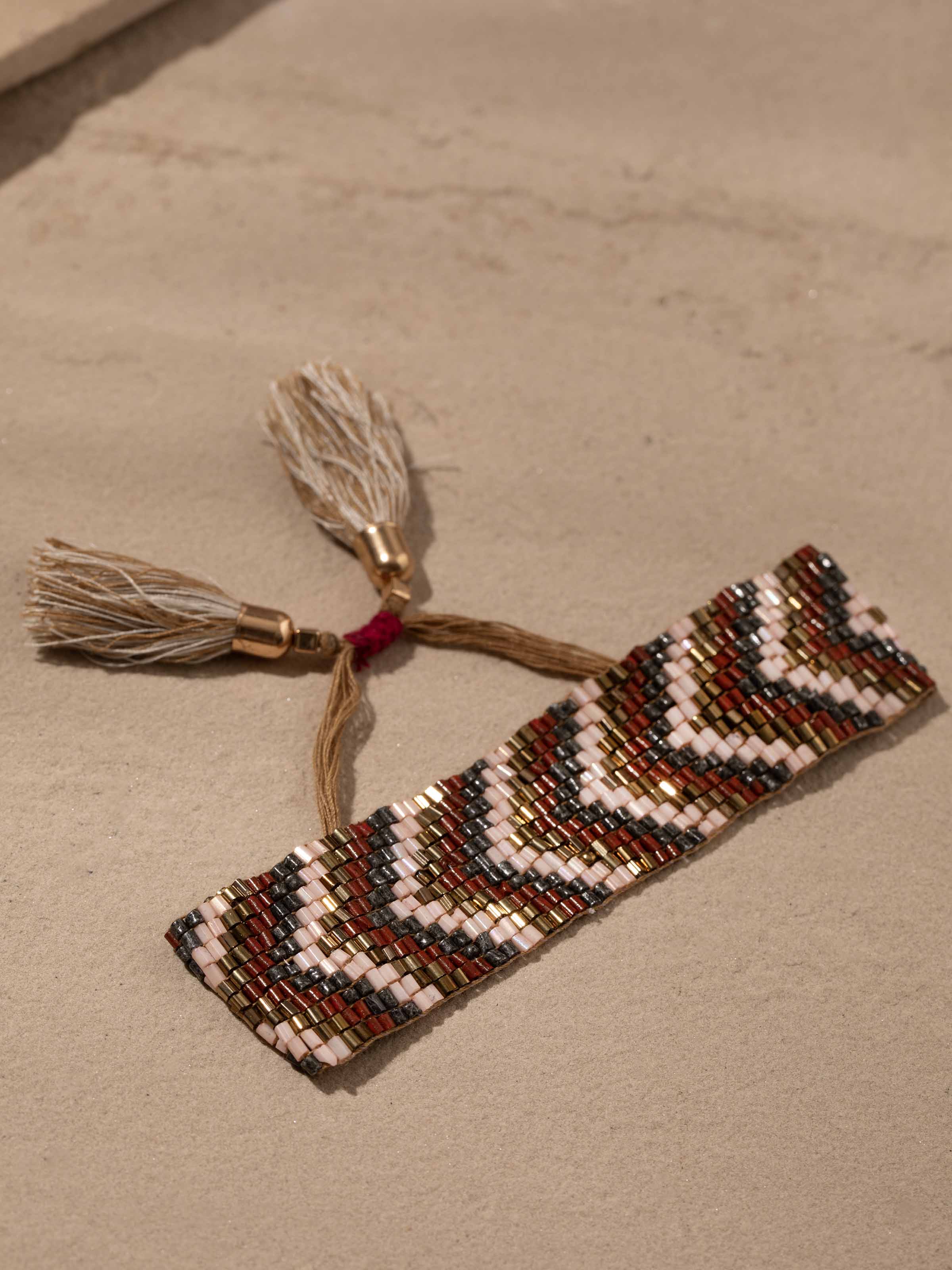 Detailed close-up of handcrafted flexible bracelet focusing on the intricate design and finish.