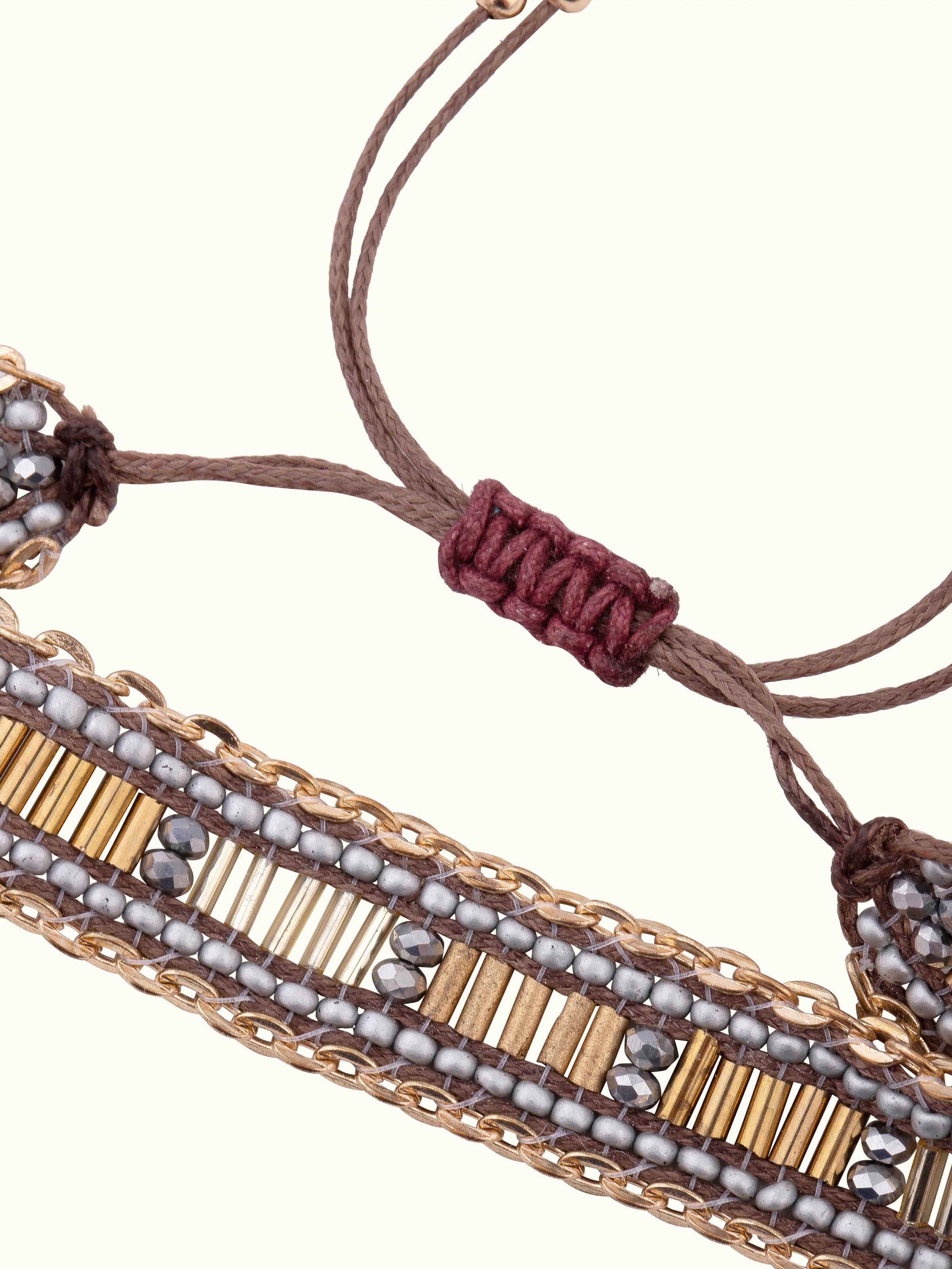 "Overhead view of handcrafted flexible bracelet displaying design elements"