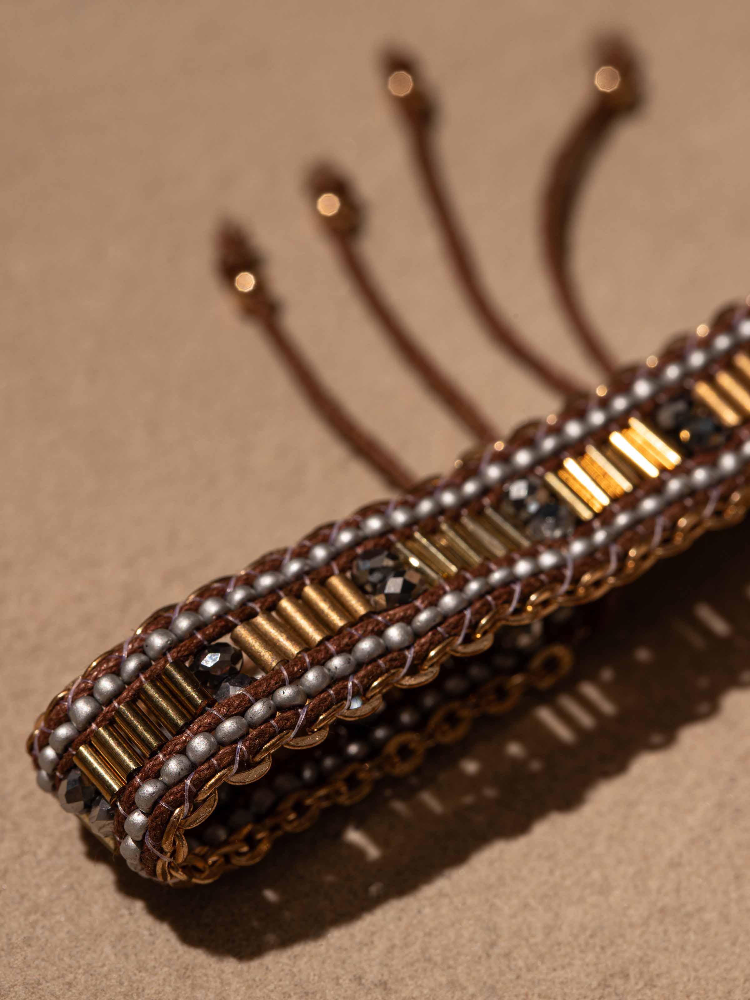 "Detailed view of handcrafted flexible bracelet emphasizing texture and design"
