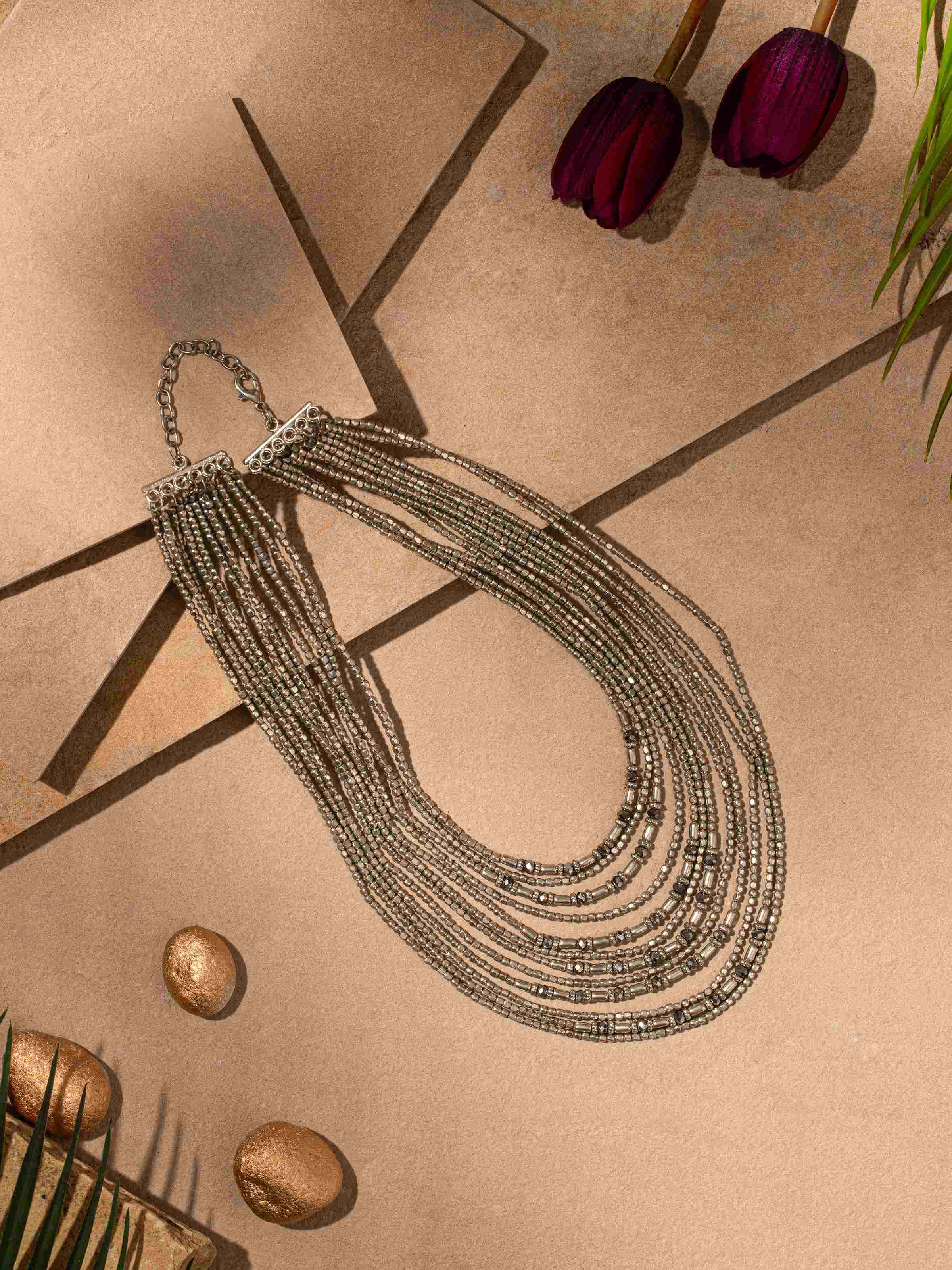 Side view of handcrafted collar necklace emphasizing its elegant design and structure