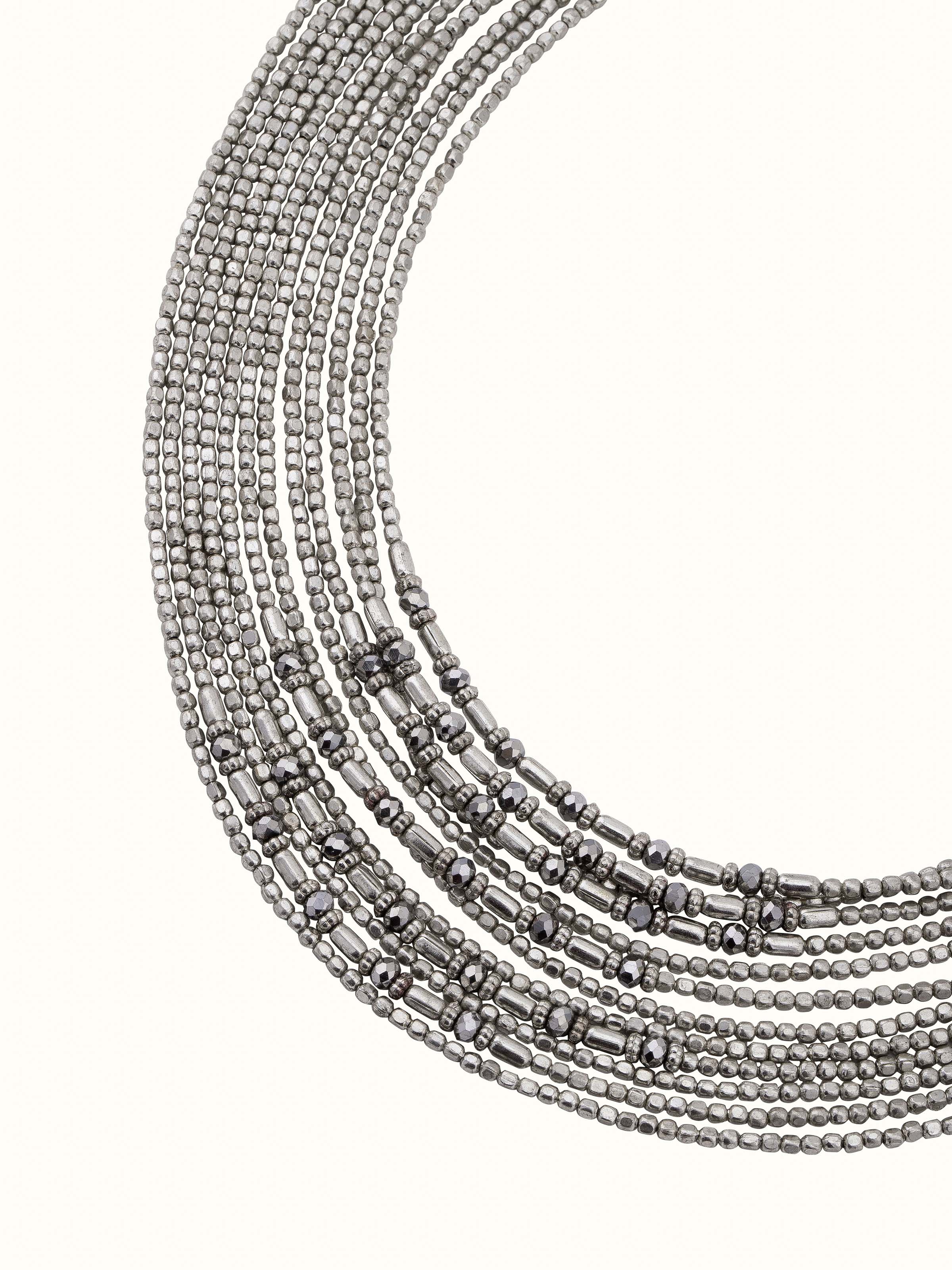 Angled view of handcrafted collar necklace highlighting its fine craftsmanship and detailed finish