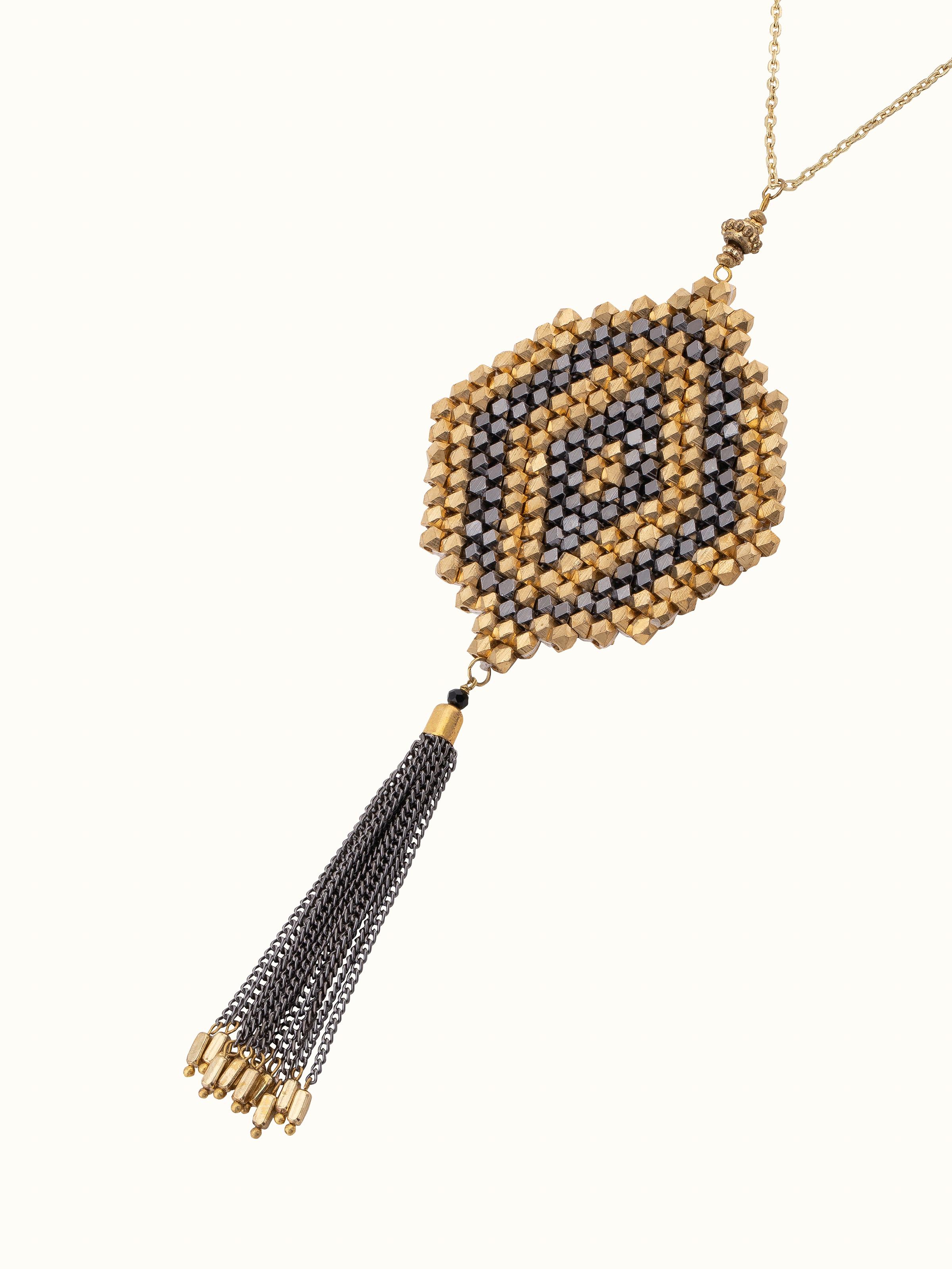 Angled view of handcrafted long necklace showcasing its elegant drape and design