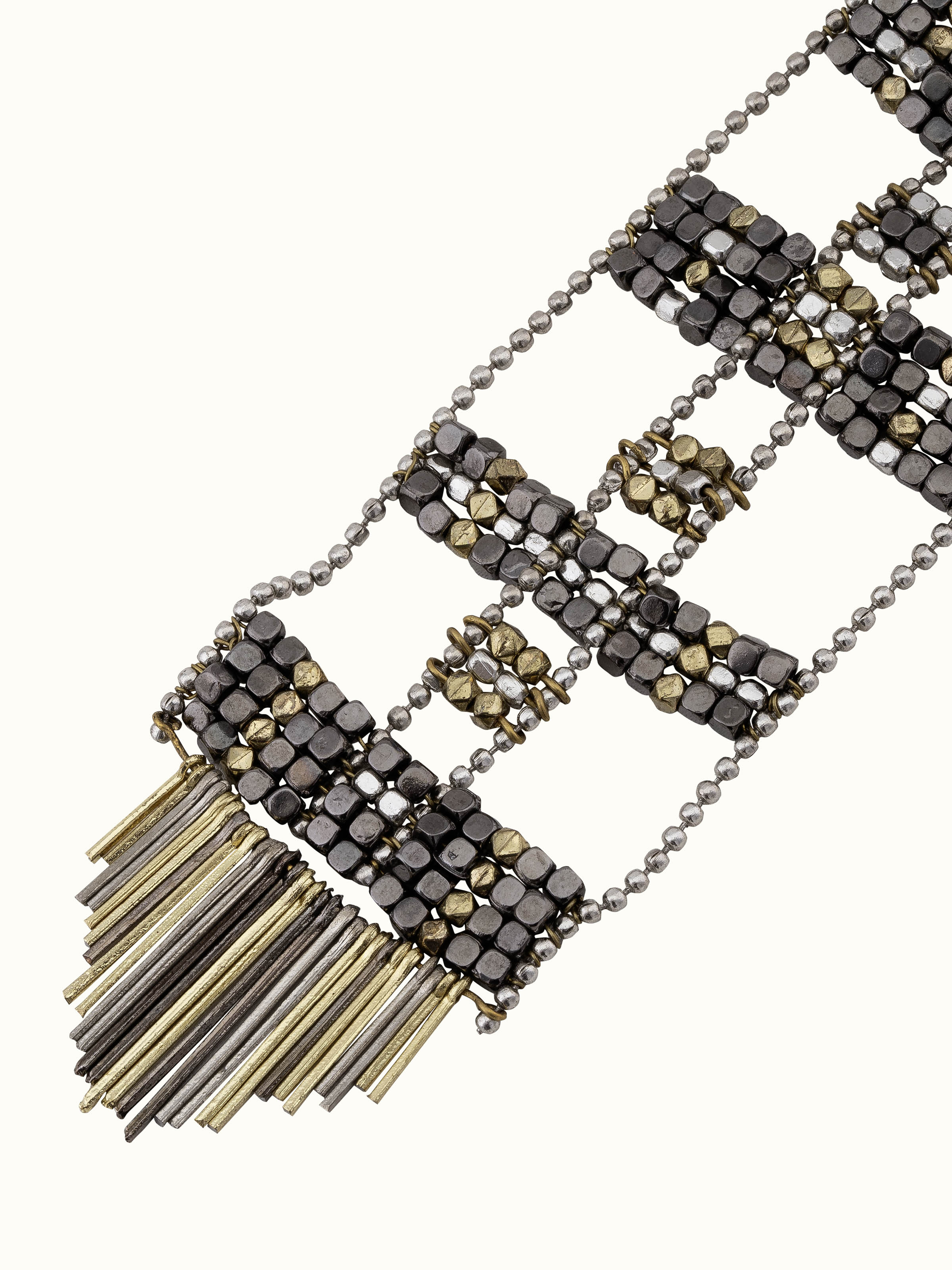 Angled view of Handcrafted long necklace focusing on intricate design and high-quality materials