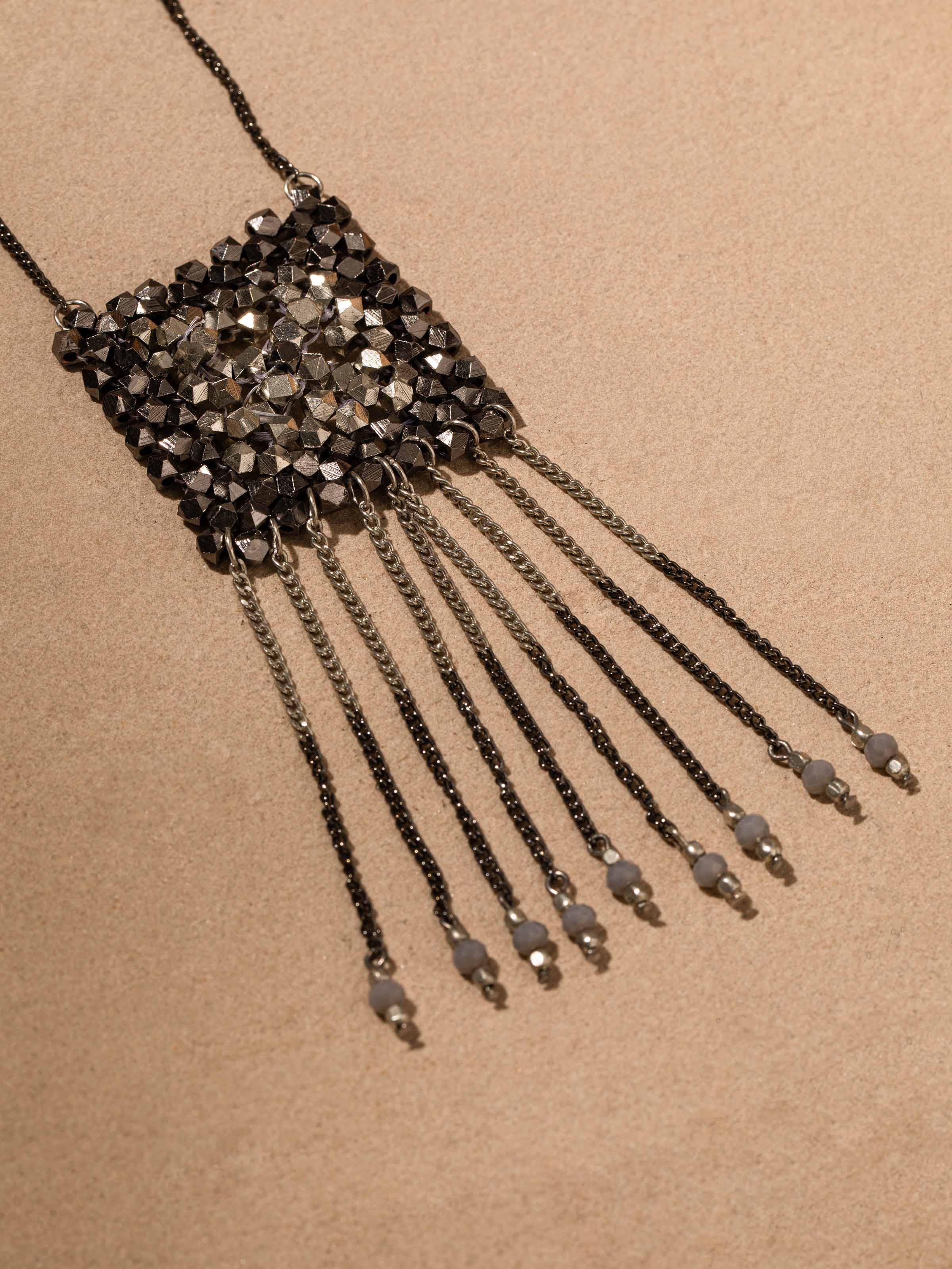 Detailed front view of Handcrafted long necklace highlighting its unique design and high-quality finish