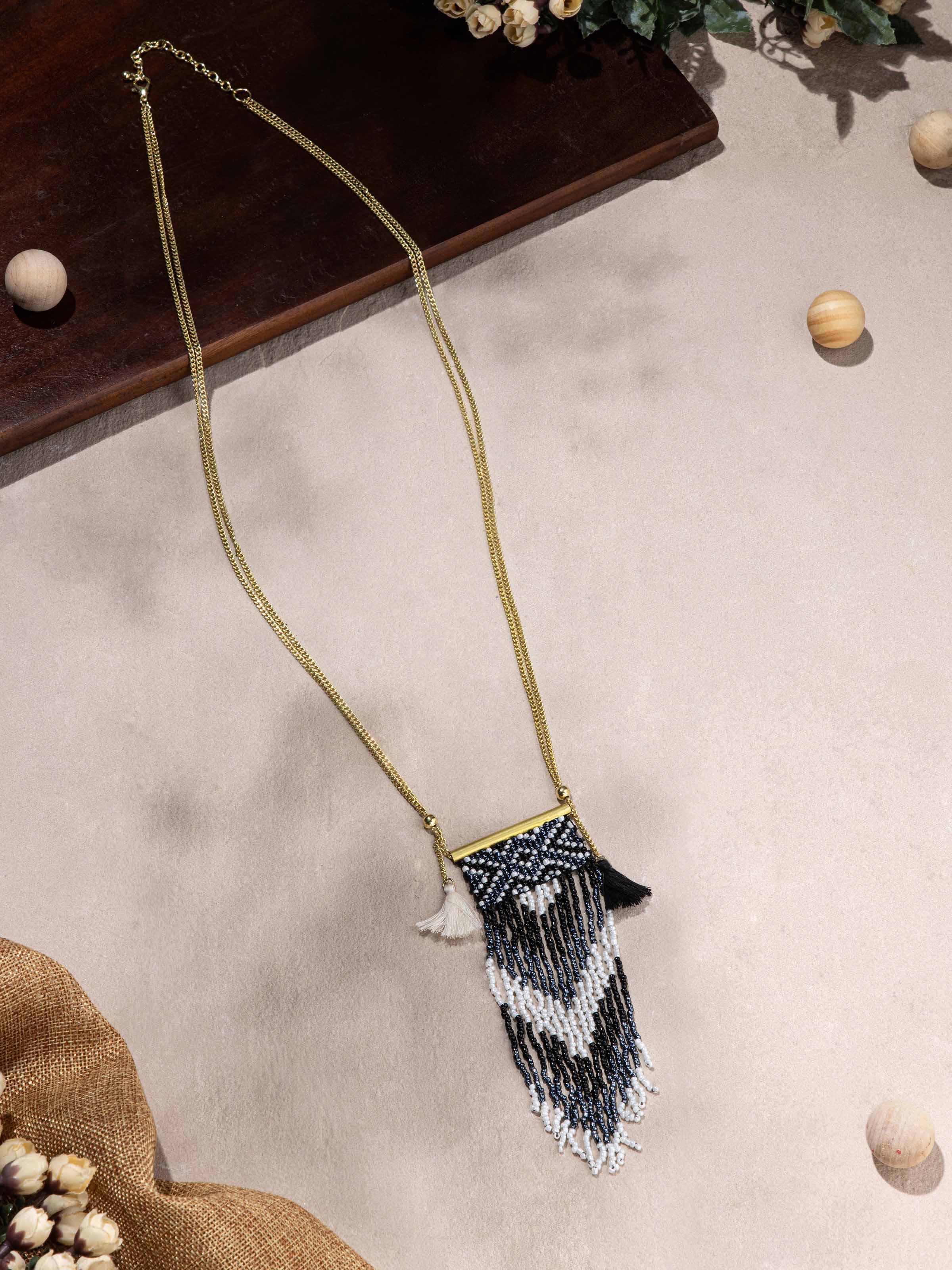 Side view of Handcrafted Long Necklace displaying the sophisticated length and style.