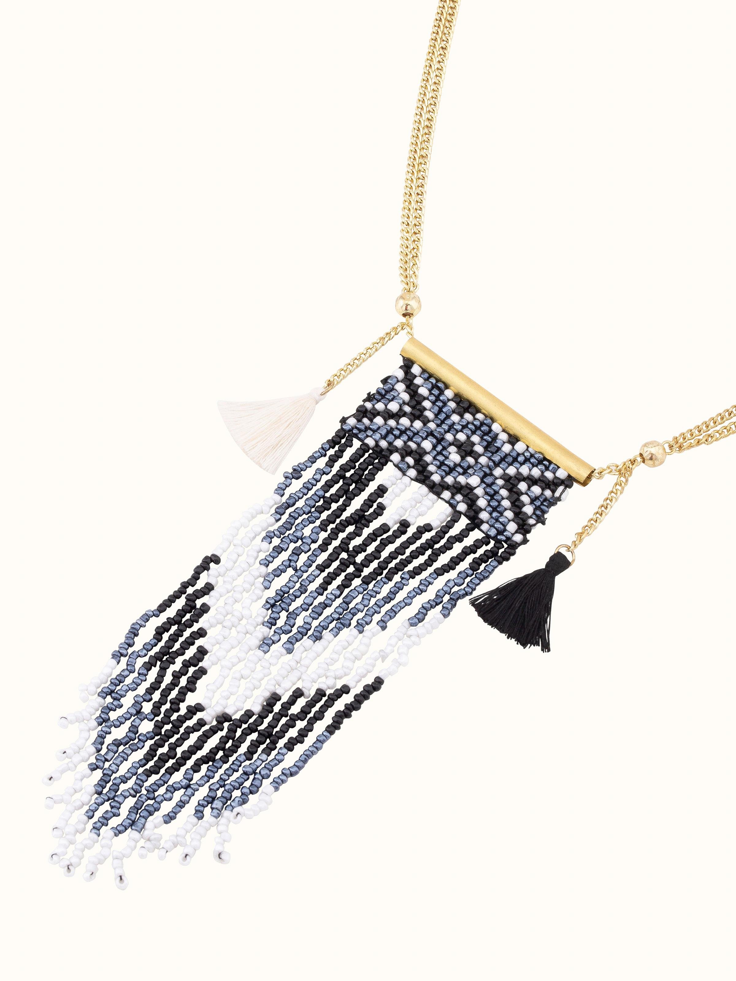 Angled view of Handcrafted Long Necklace emphasizing intricate details and craftsmanship.