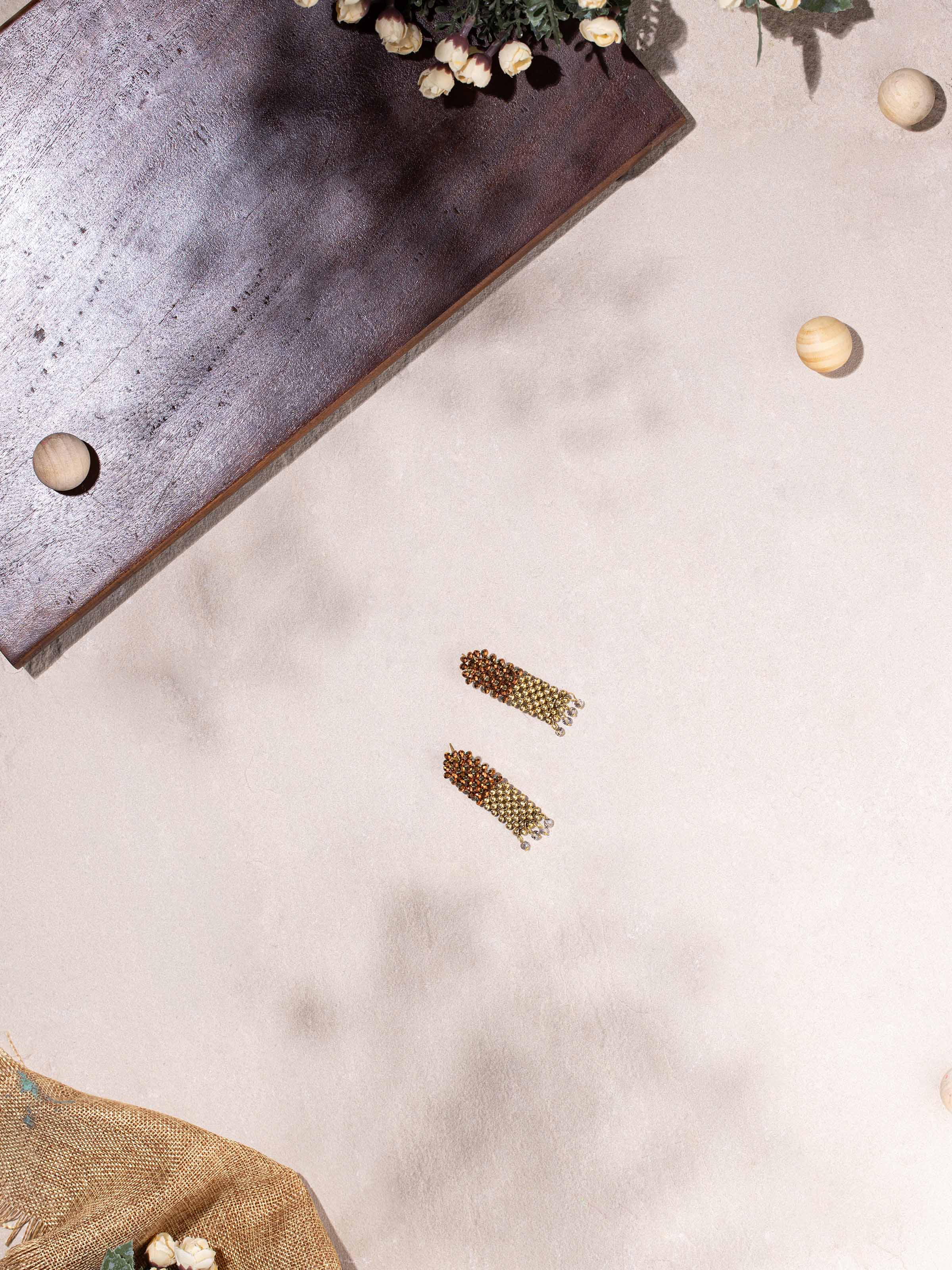 Close-up view of Handcrafted Drop Earrings featuring fine metalwork and intricate design details.