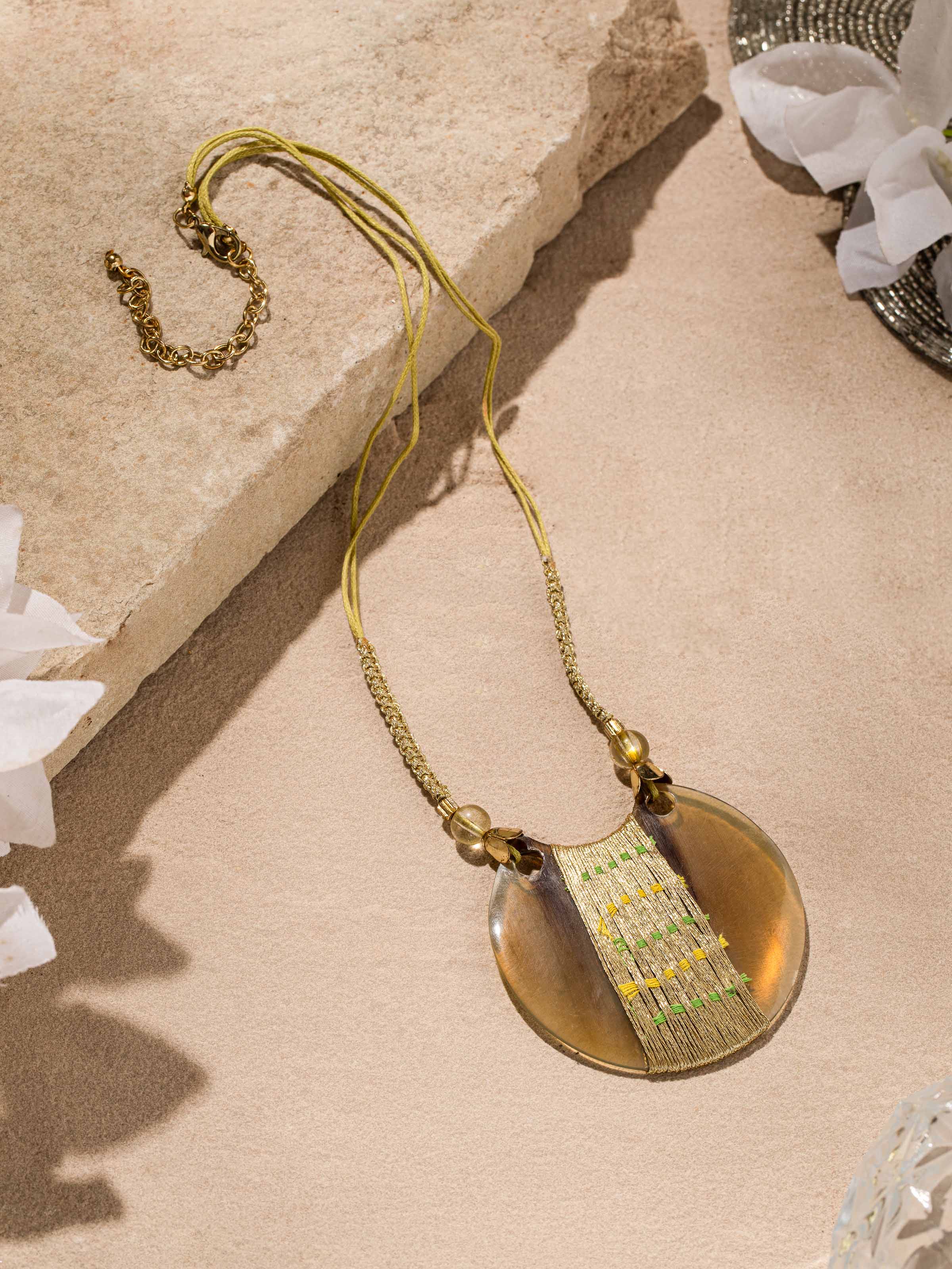 Close-up view of handcrafted long necklace highlighting its fine detailing and design