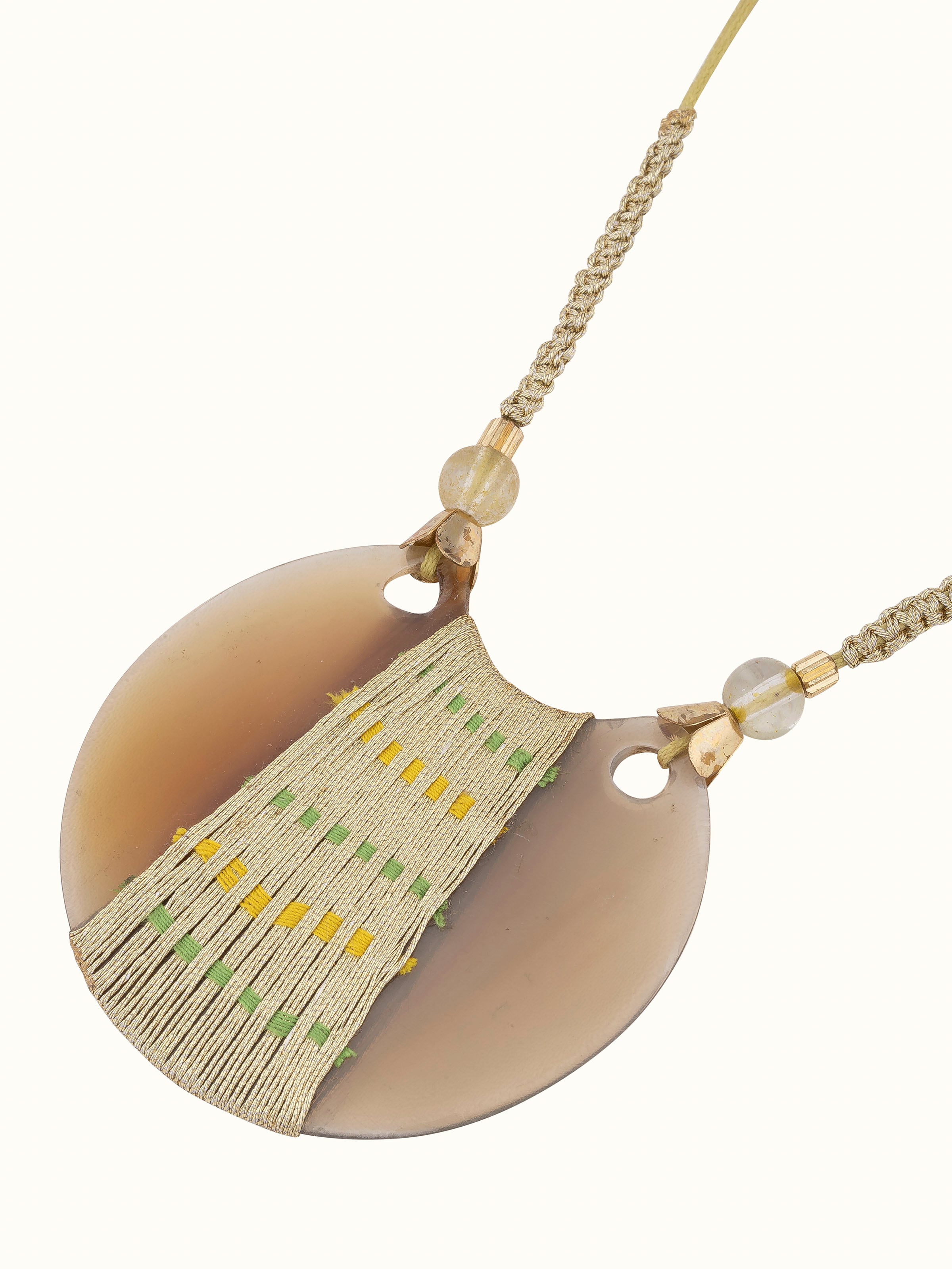 Angled view of handcrafted long necklace showcasing its stylish and elegant design