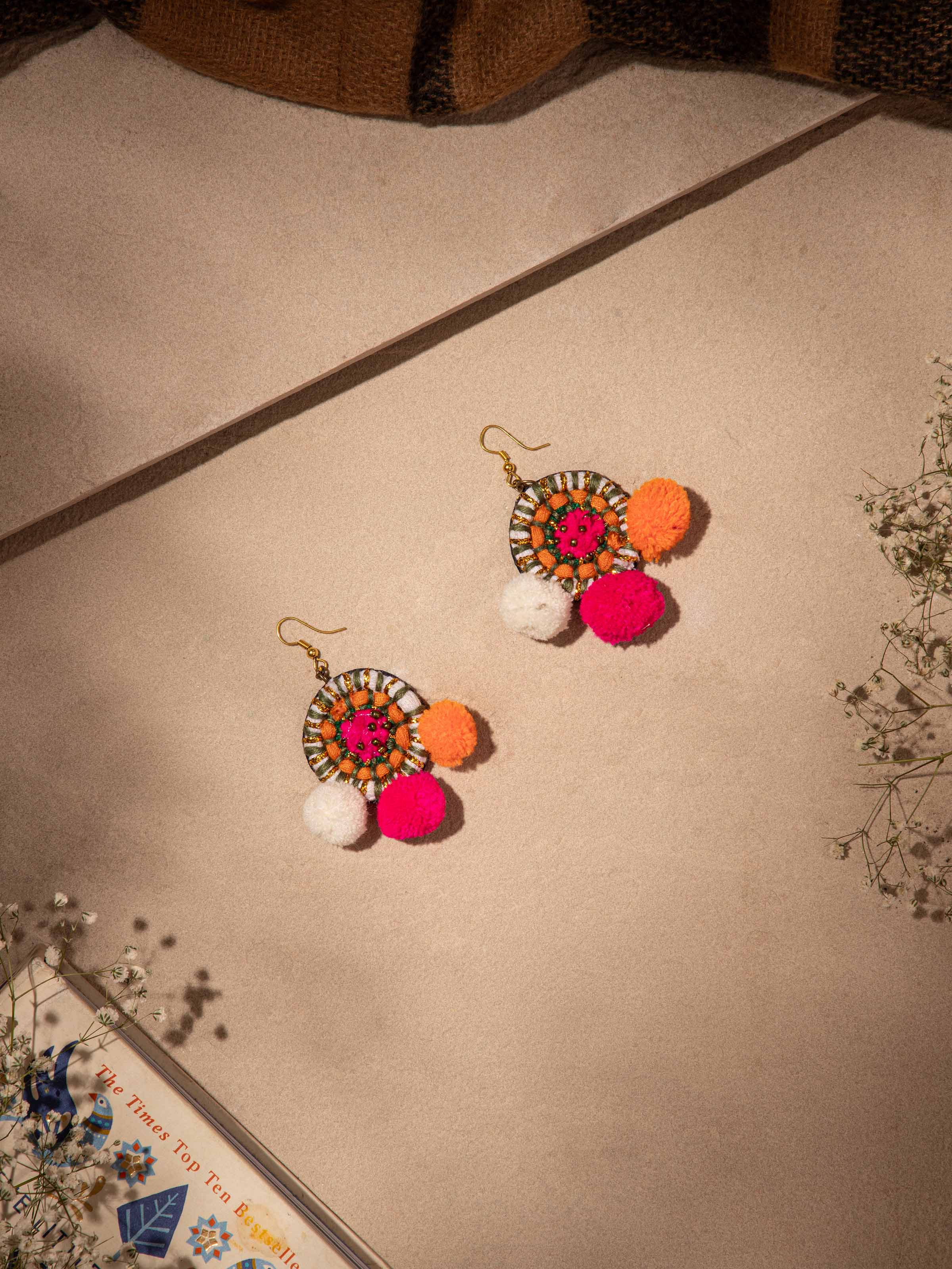 Side view of Handcrafted Drop Earrings showcasing the intricate design and artisanal details.