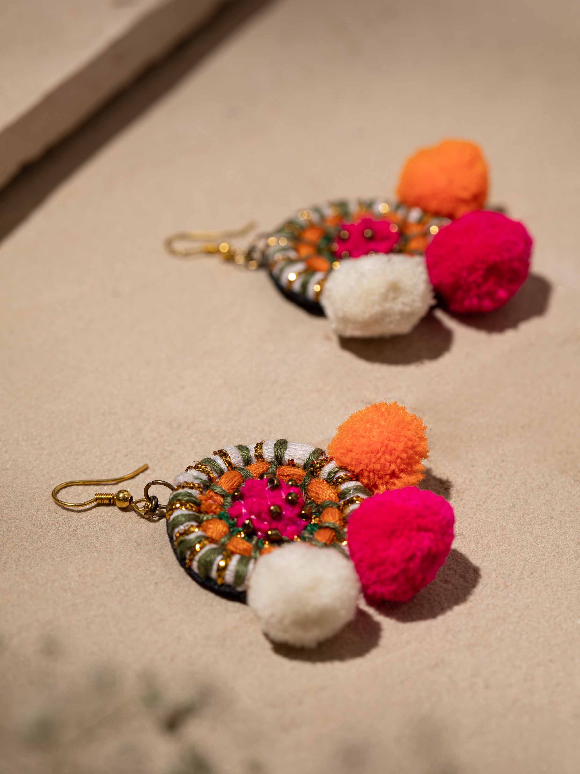 Detailed view of Handcrafted Drop Earrings showcasing the fine detailing and artistic craftsmanship.